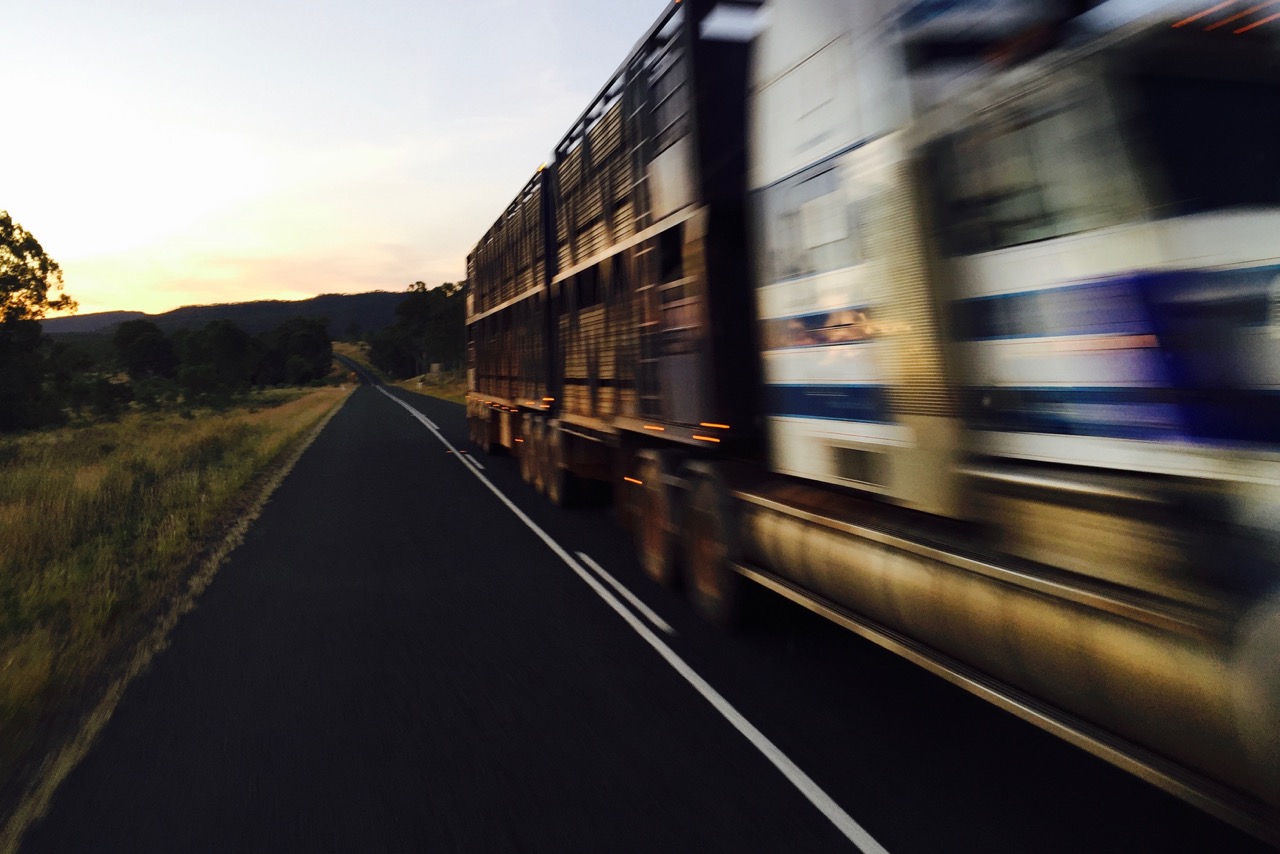 Pictured: The rush of a Kenworth Road Train on the Capricorn Highway at sundown a few weeks ago.