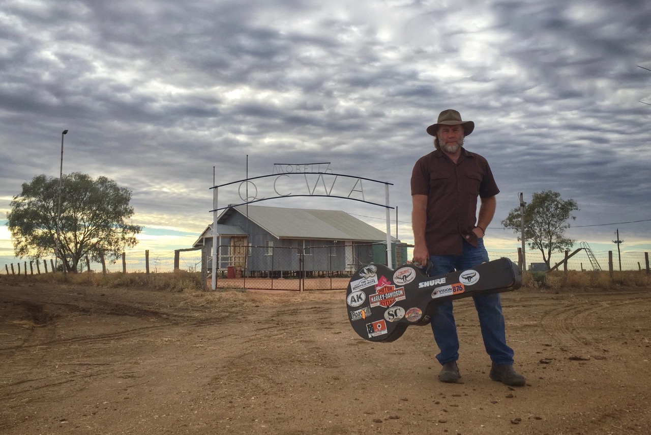 Pictured: Steve with guitar at the old Morella CWA Hall north of Longreach, Queensland