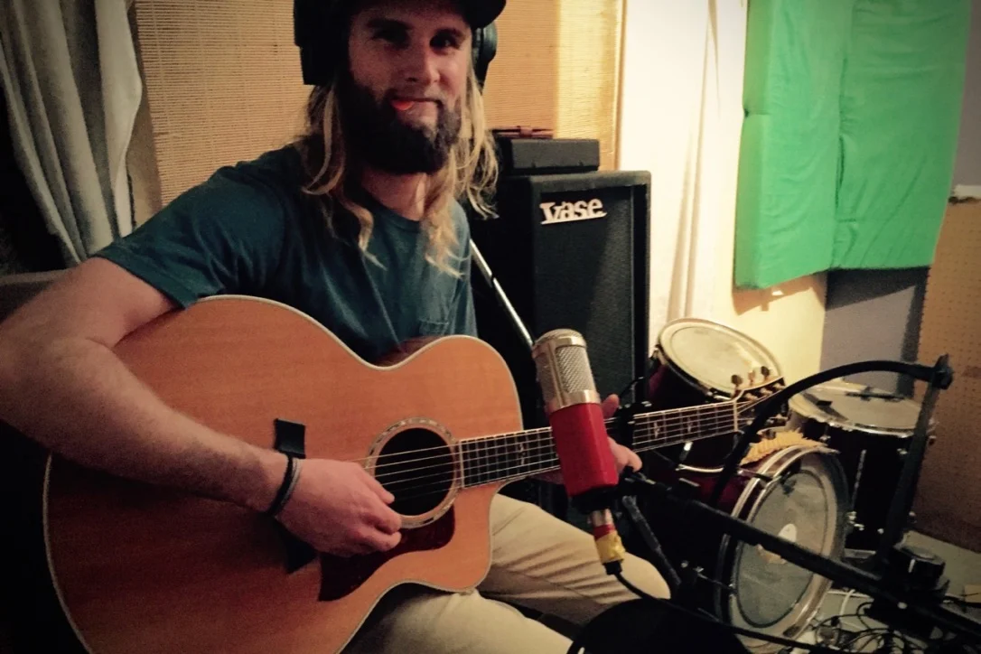 Pictured: Jordan Grace laying down a final acoustic track for Children of the Western World.