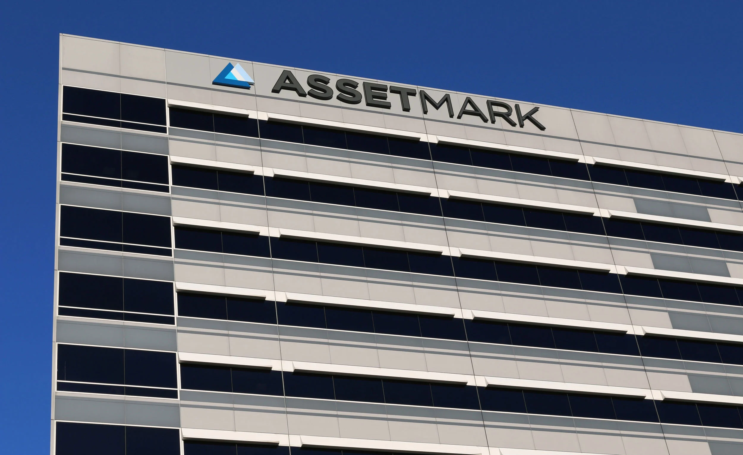 AssetMark Signage: We designed backlit building signage for AssetMark's move to their new headquarters