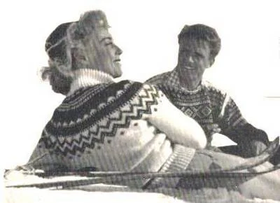 Scene from the Norwegian film Troll i ord, 1954, where all actors are wearing sweaters from Unn Søiland Design and Production. A Danish female star is wearing the Eskimo sweater and Marius Eriksen who is wearing a dark blue Marius sweater with white shoulders.