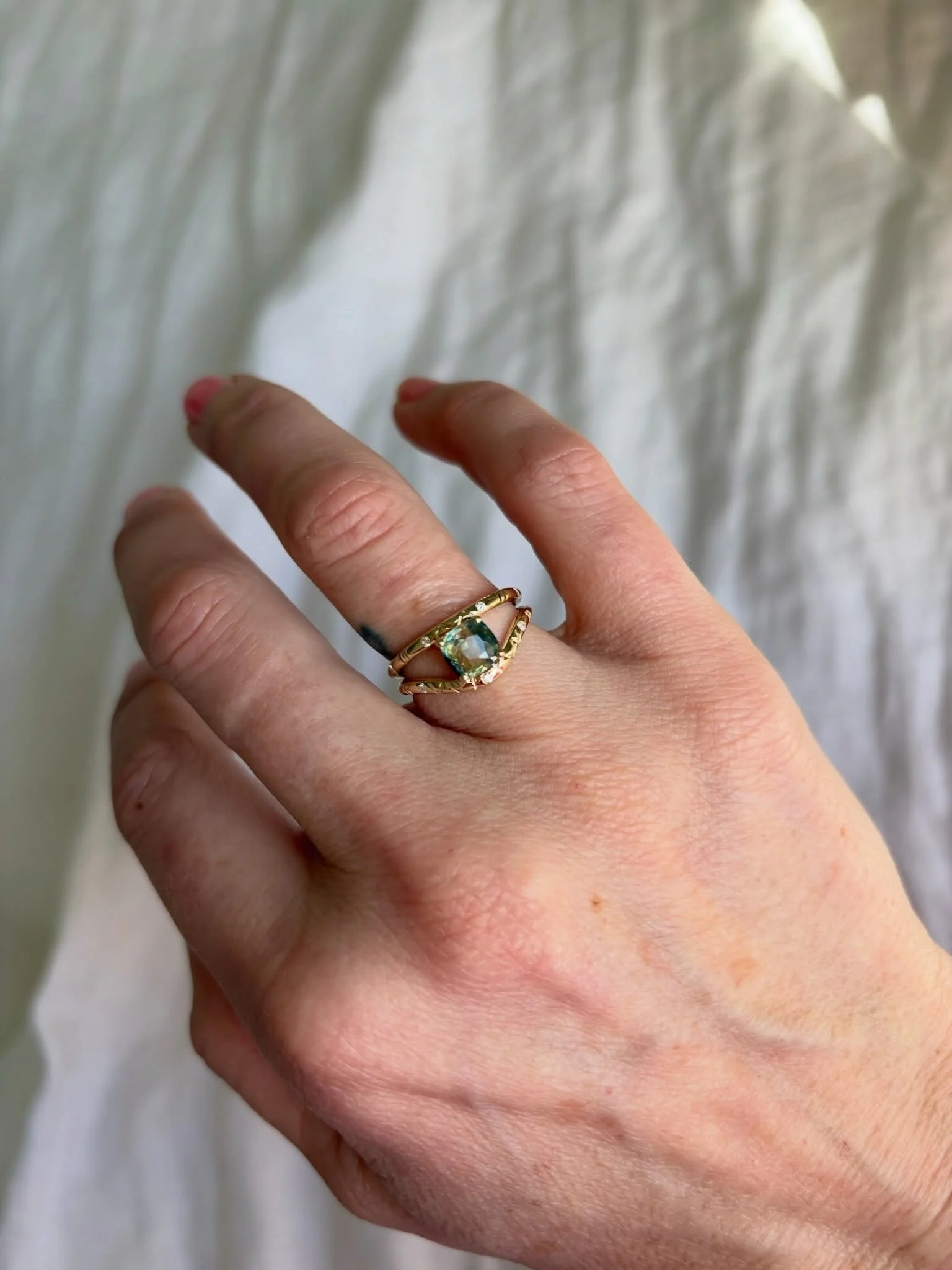 Such a pleasure bringing this bespoke vision to life 🤍

A stunning sapphire, held together by two 18ct gold rings &mdash; both etched with our signature Wild Love pattern. 

Completely unique in style, and ethical in its nature. 

Start your own bes