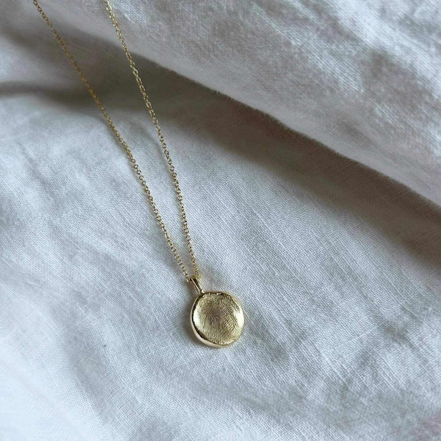 A finger print held close to your heart 🤍

This Full Moon Disc Necklace has been personalised with the imprint of a loved one&rsquo;s finger print. A memento to keep with you throughout life&rsquo;s many adventures.