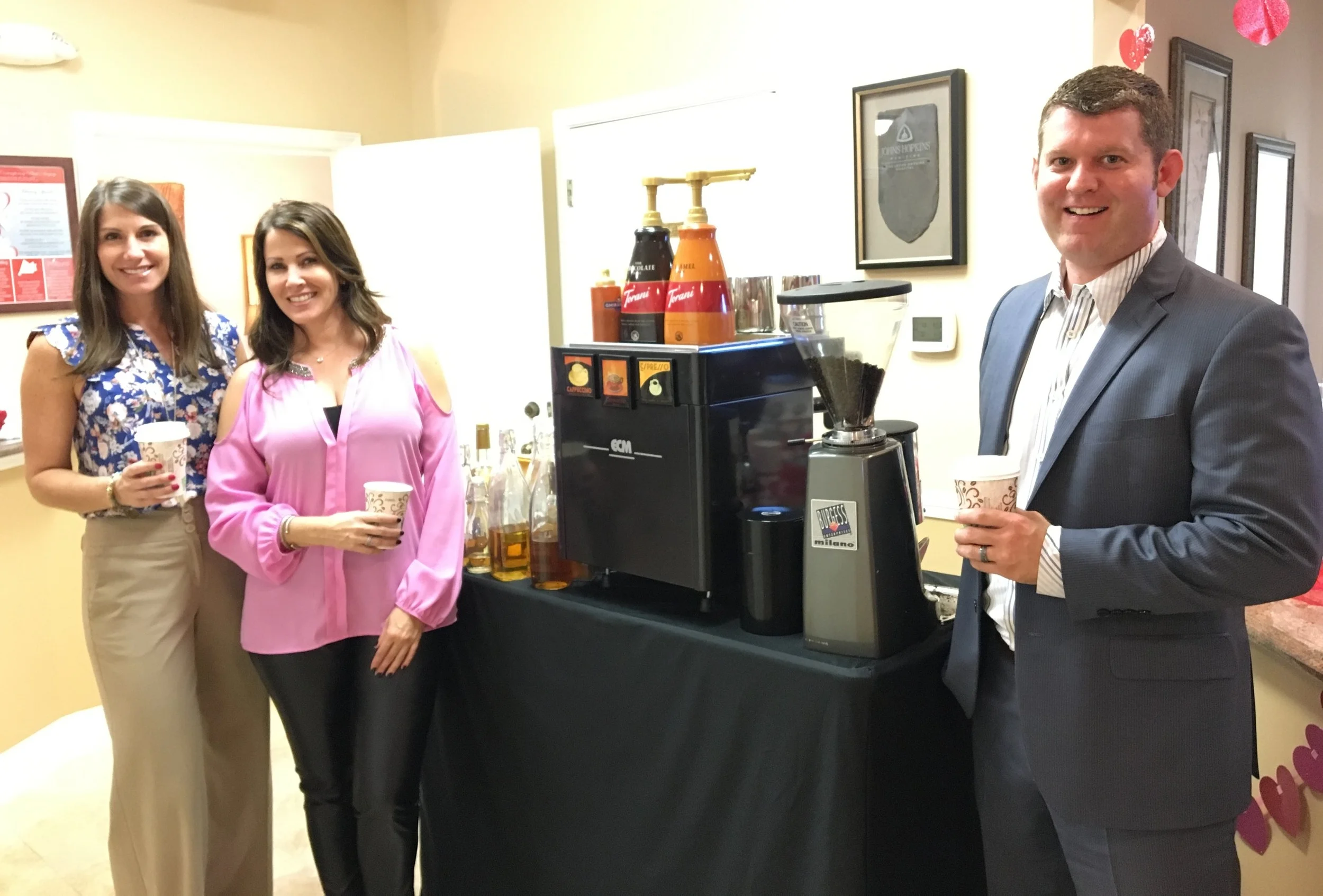 Treating clients at a physician's office to a cup of specialty coffee, compliments of these amazing Allergan representatives.