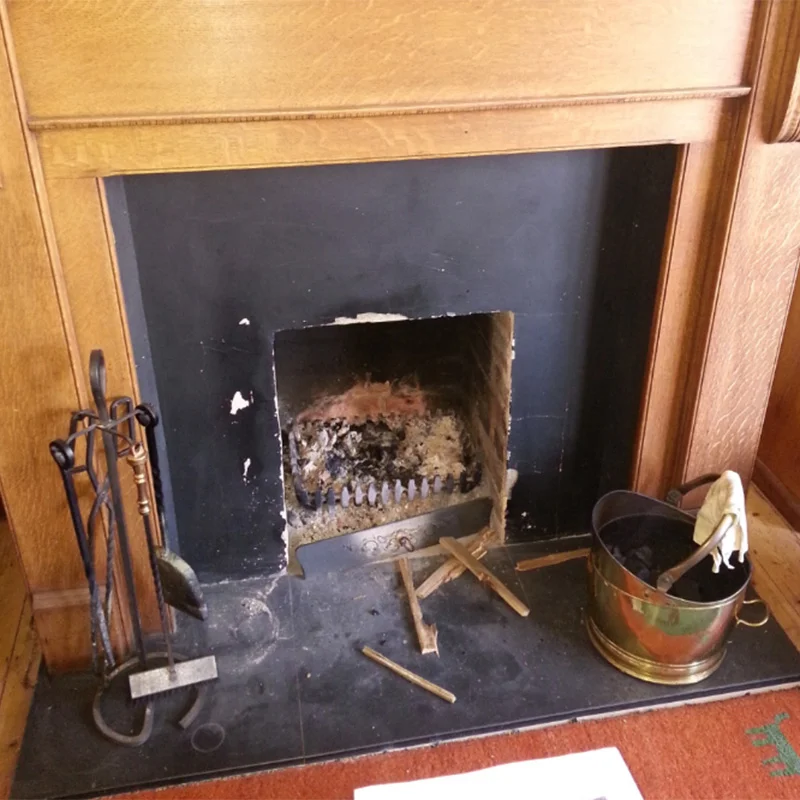 Builders opening needed to be restored. Slate hearth  needed to be polished.