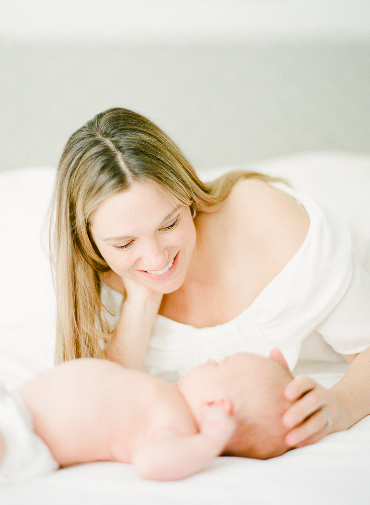 Mom and Baby on Bed Newborn Photos