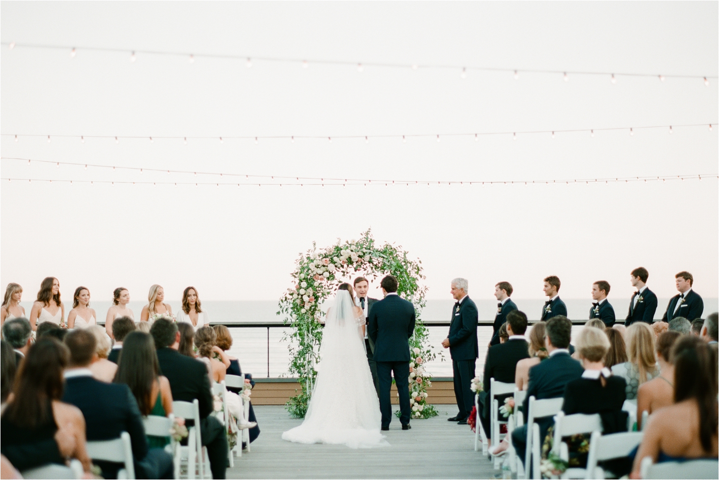 Exchanging Wedding Vows Outside Wedding Ceremony at Gurneys Forward Deck