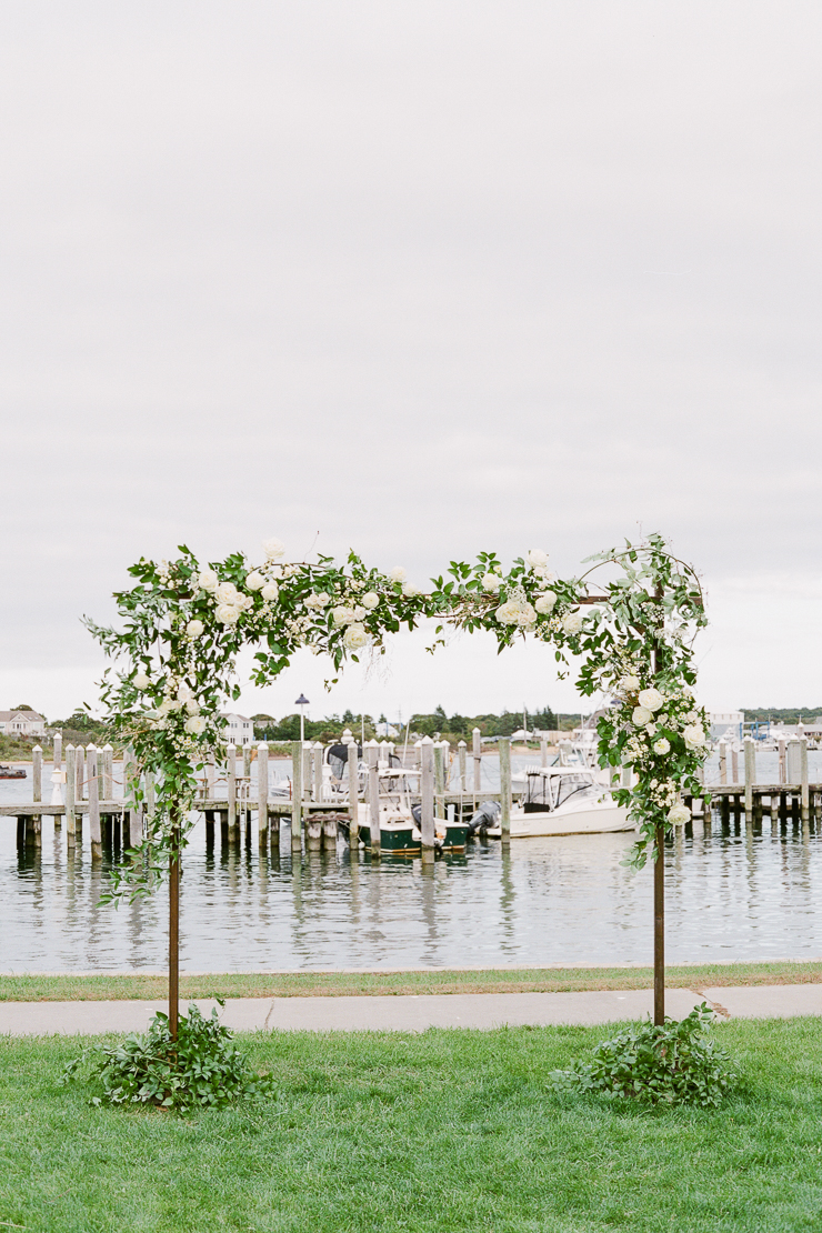 Green and White Floral Arch by AvaFloral Gurneys Star Island Wedding Photos