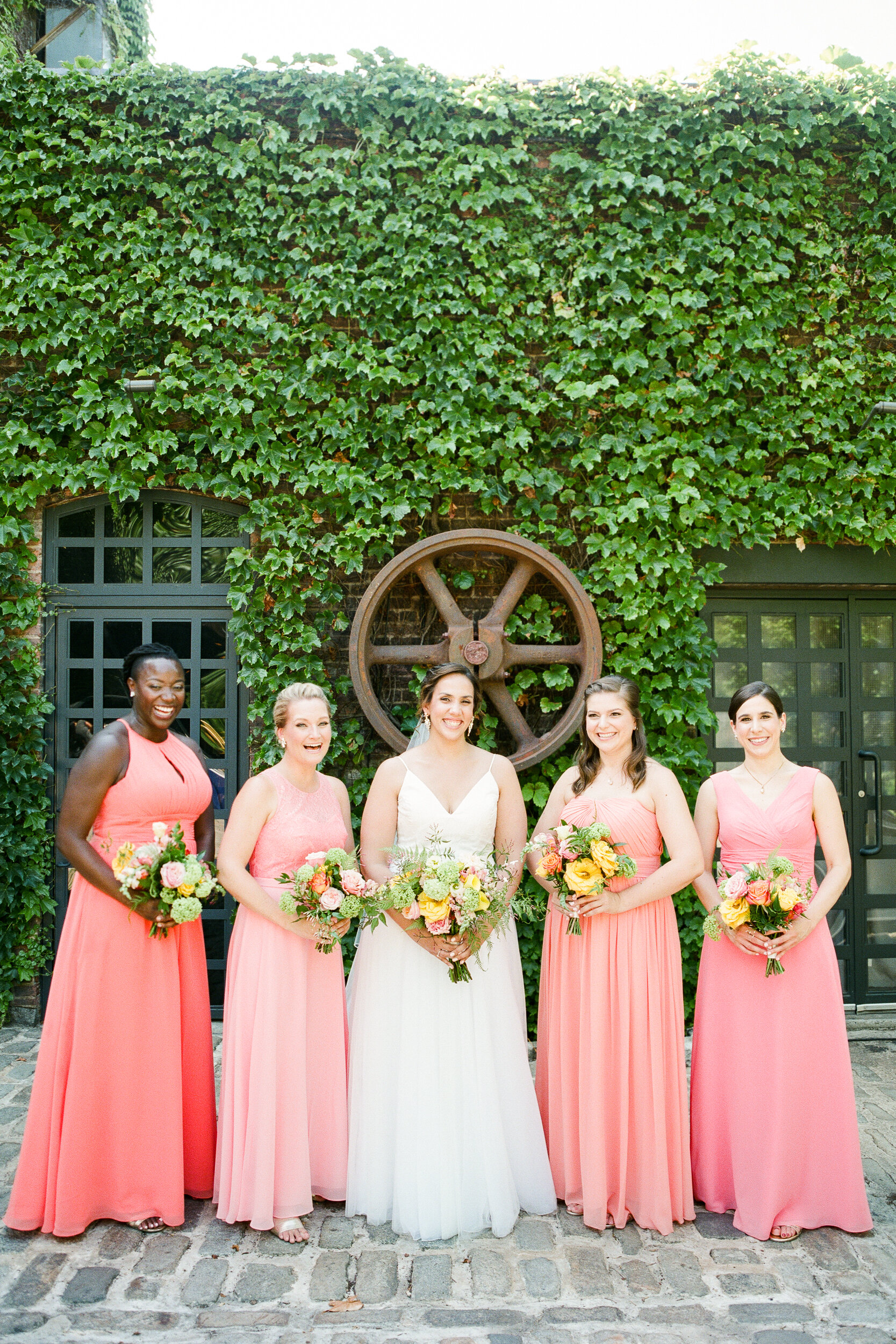 Coral Bridesmaids Dresses with Bright Wedding Bouquets