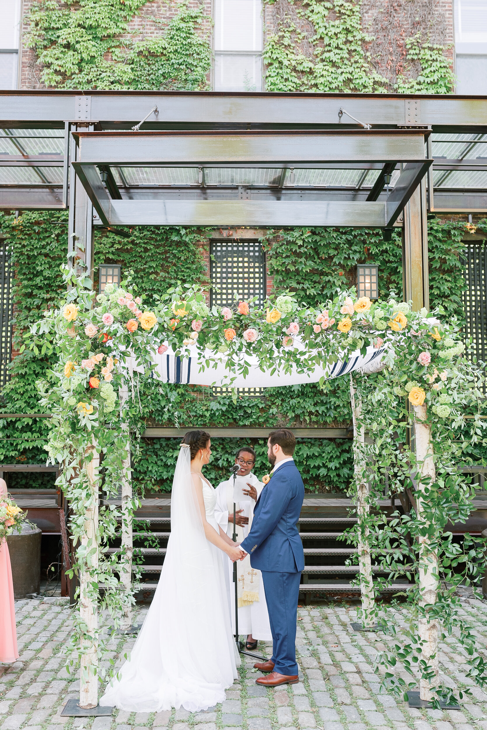 Bride and Groom exchanging vows at The Foundry