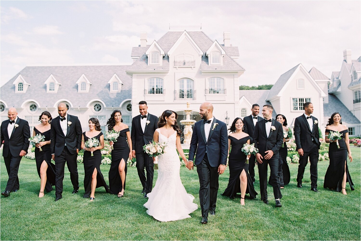 Bridal Party Walking on the front lawn at The Park Chateau