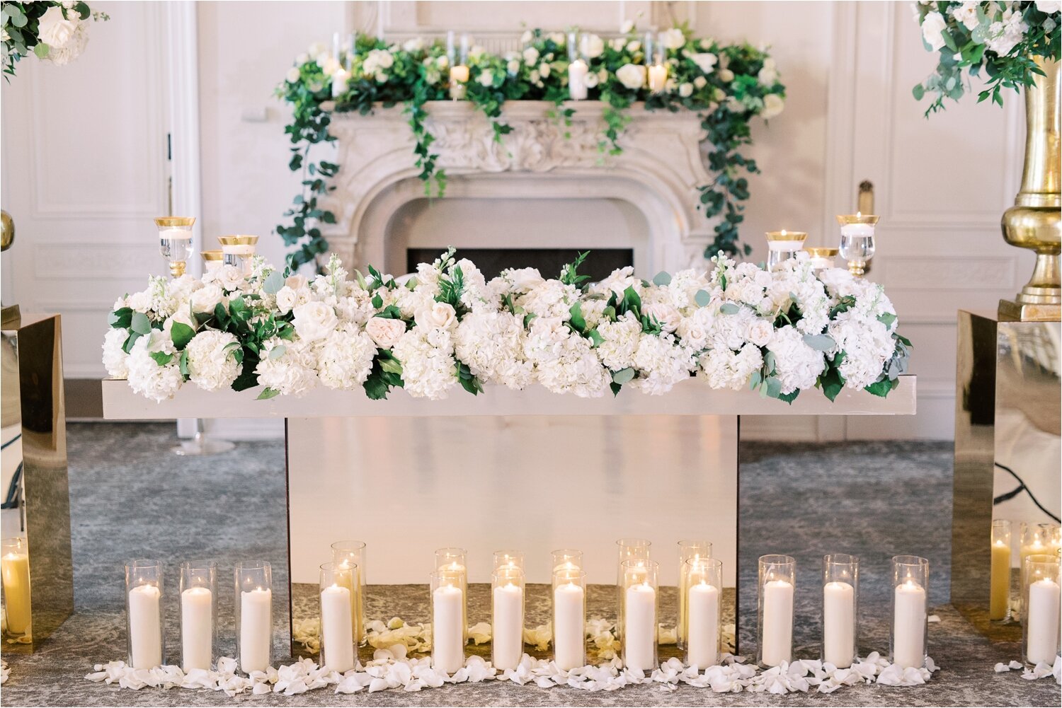 Candles, White, and Green Photos Sweetheart Table at The Park Chateau