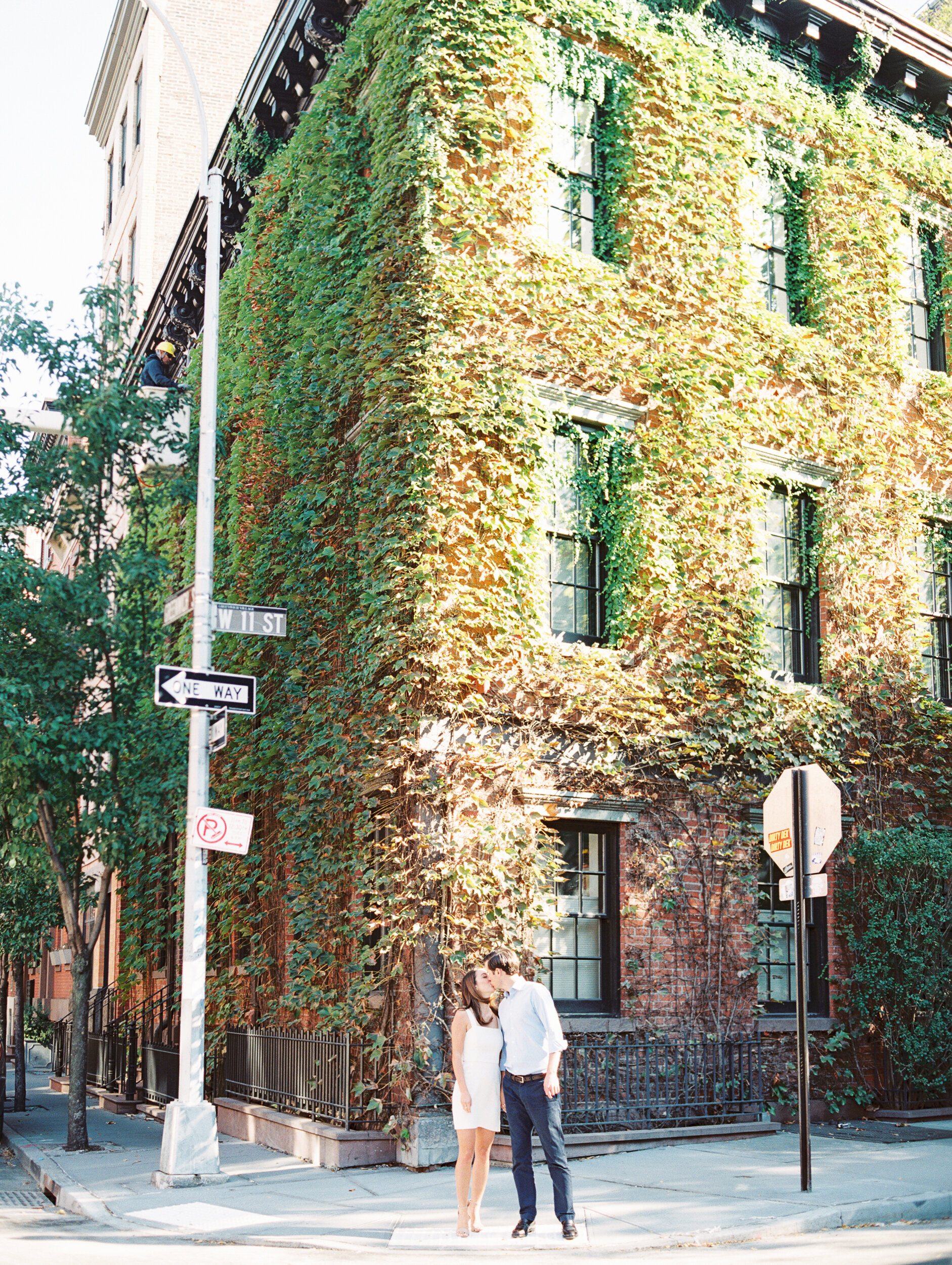 Ivy Covered Building in Background of Engagement Session Photos