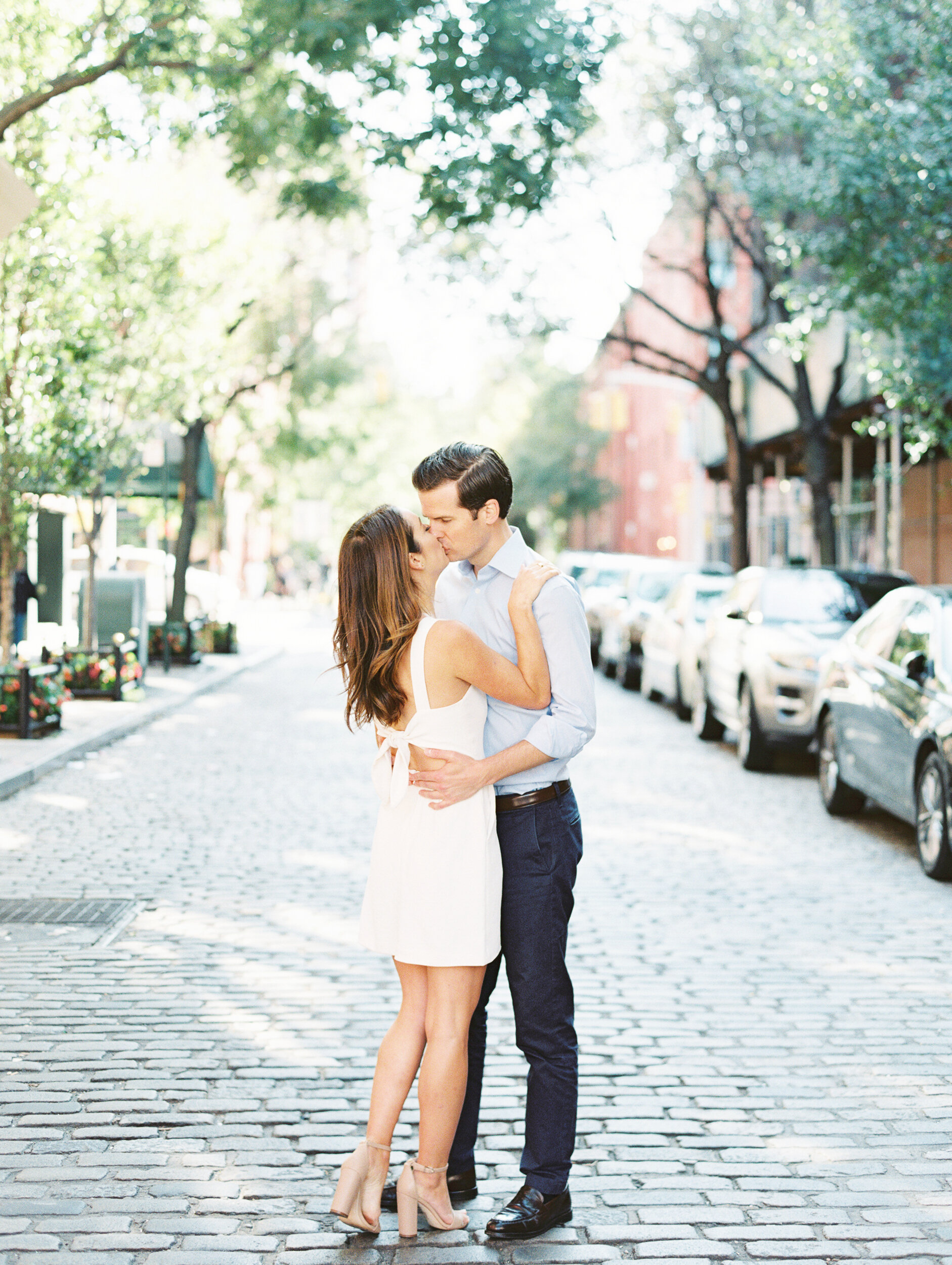 Couple Kissing on Cobblestones Streets in New York City