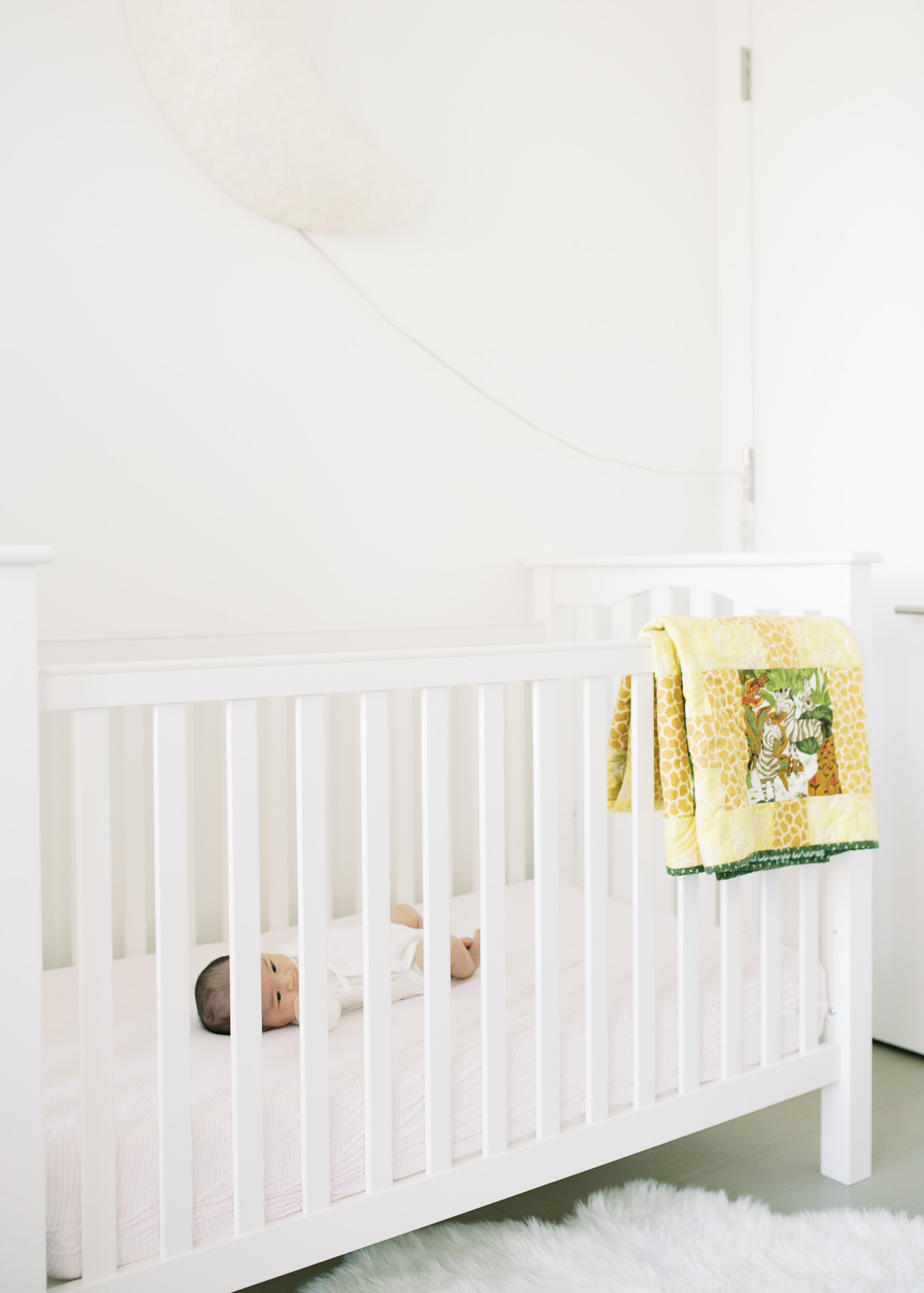 White Nursery with white crib