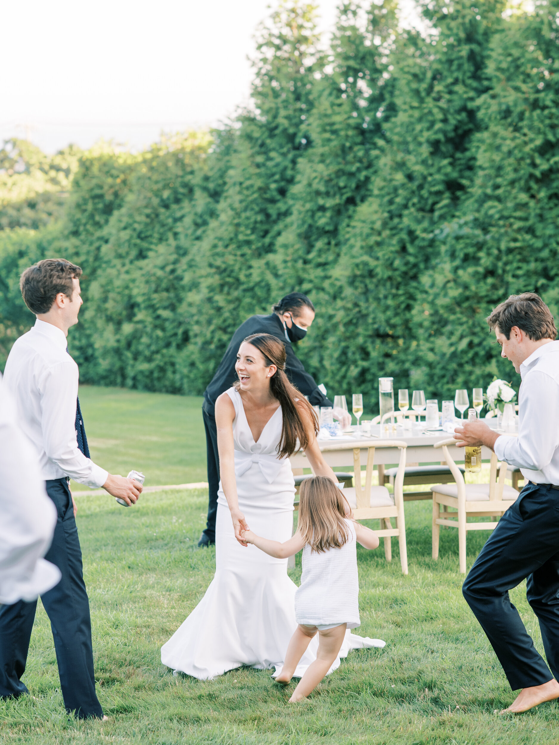 Bride Dancing with girl at Micro Wedding in the Hamptons