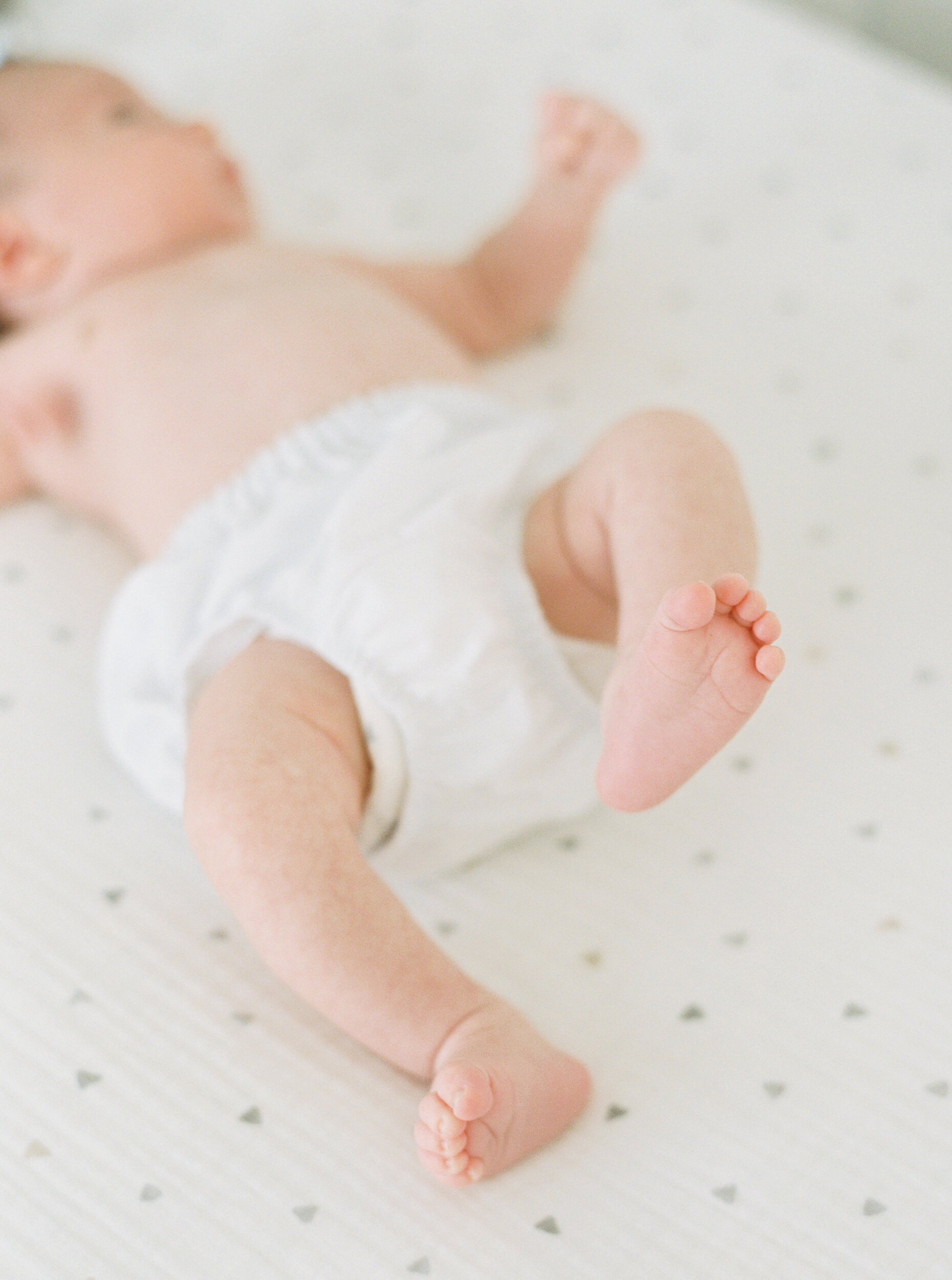 Newborn Baby in Bed in Nursery, Newborn Photography in New York City 