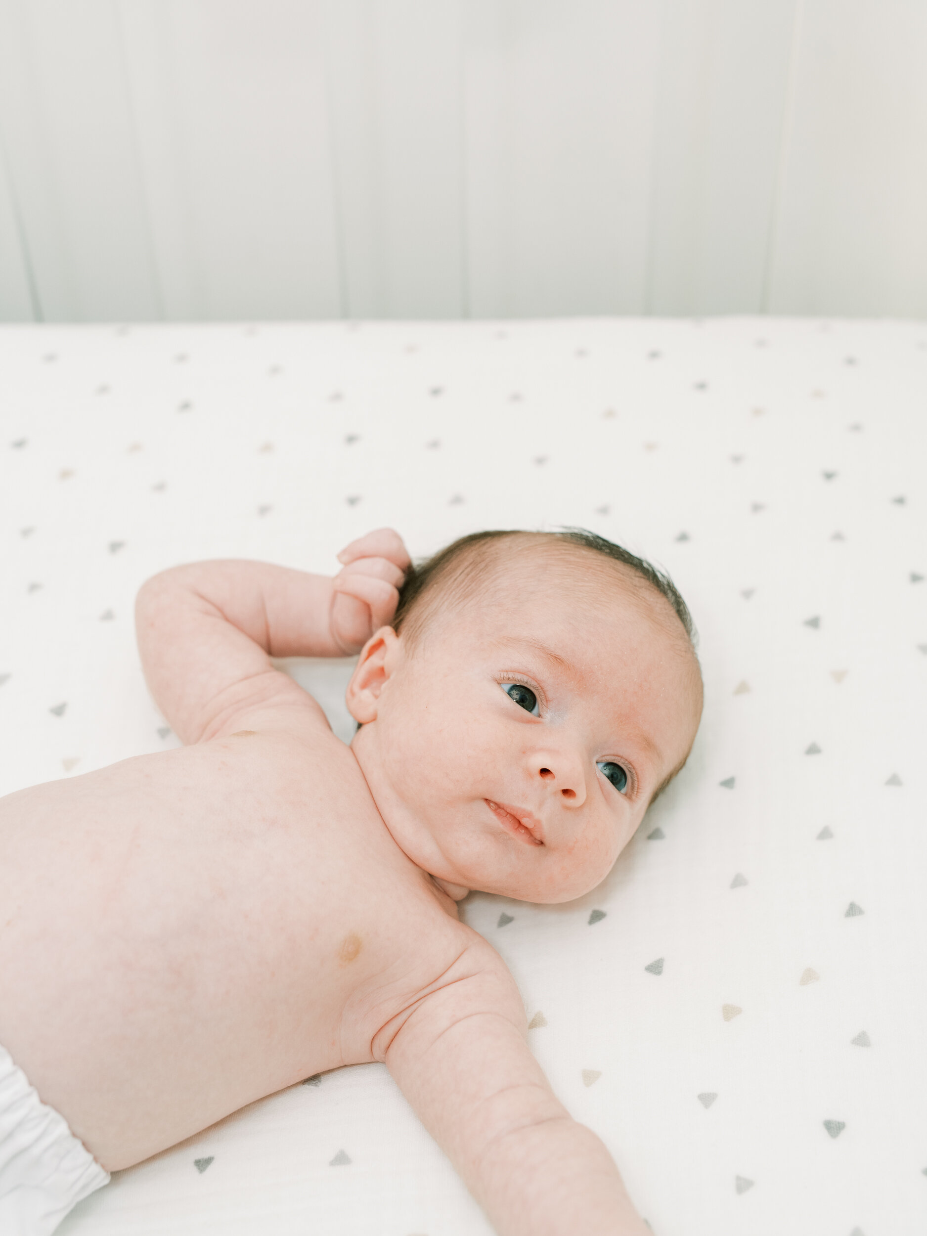 Newborn Baby in Bed in Nursery, Newborn Photography in New York City 