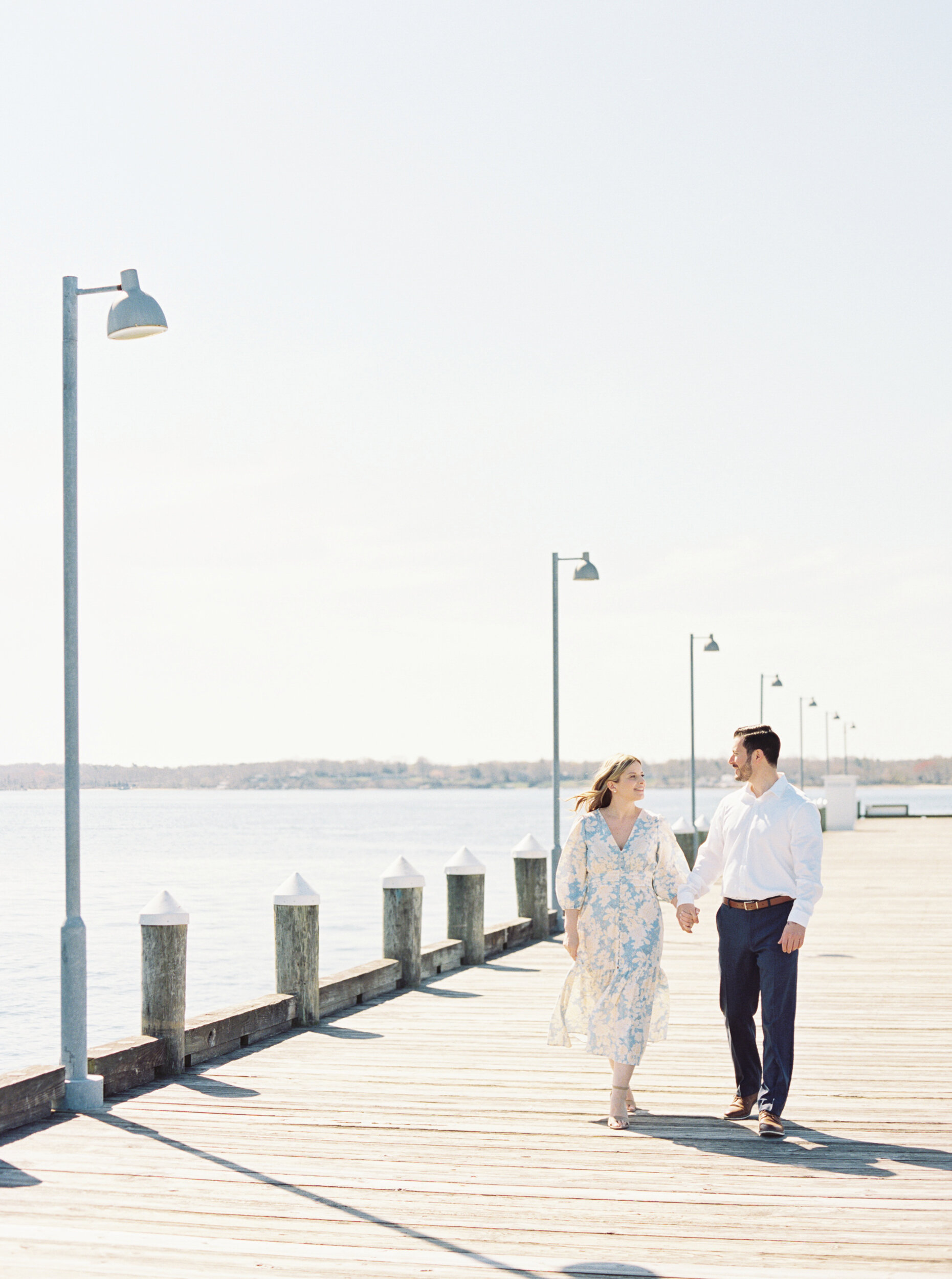 Engagement photos on pier in Greenport 