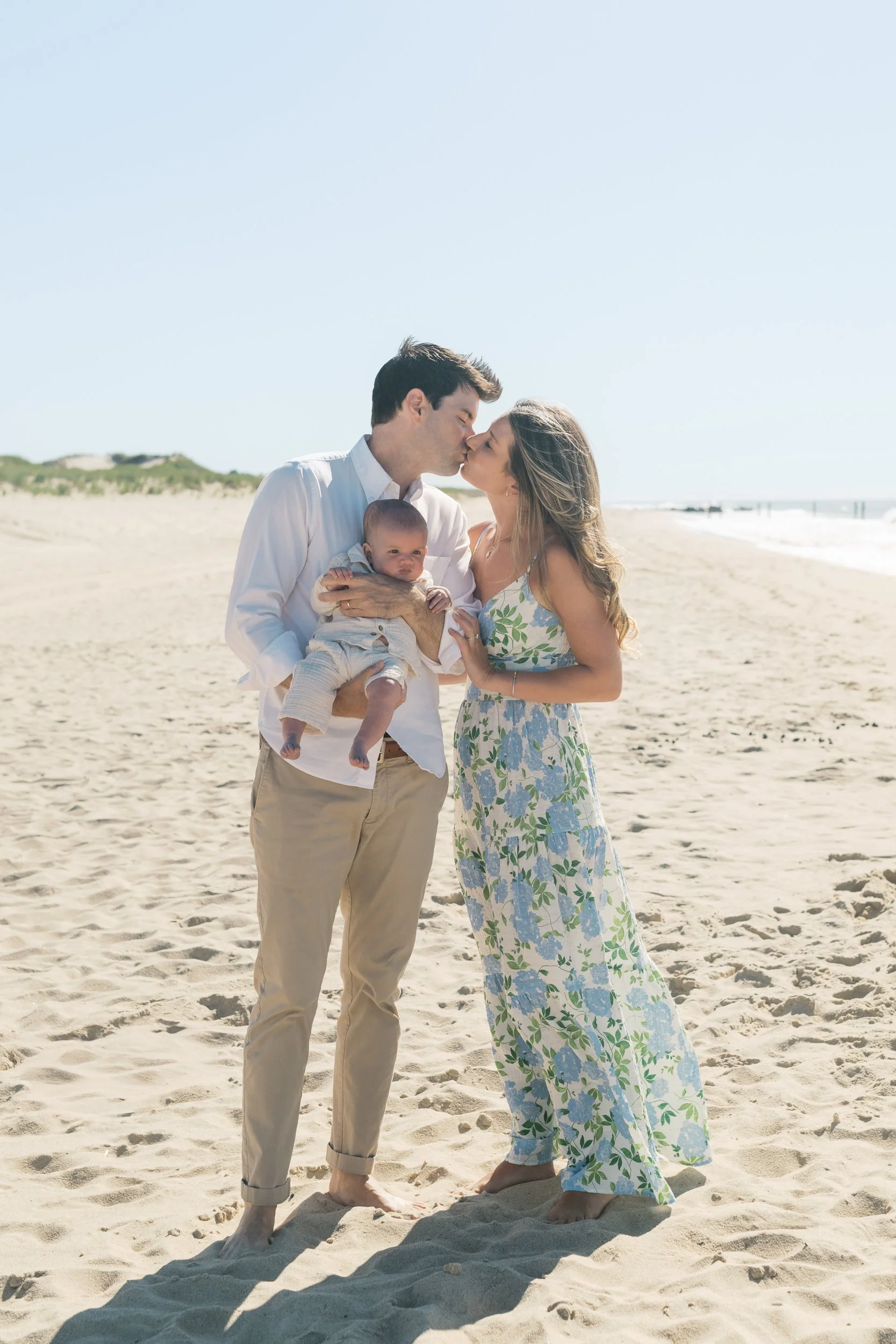 7. Parents and their four month old son on a blue bird day in East Hampton