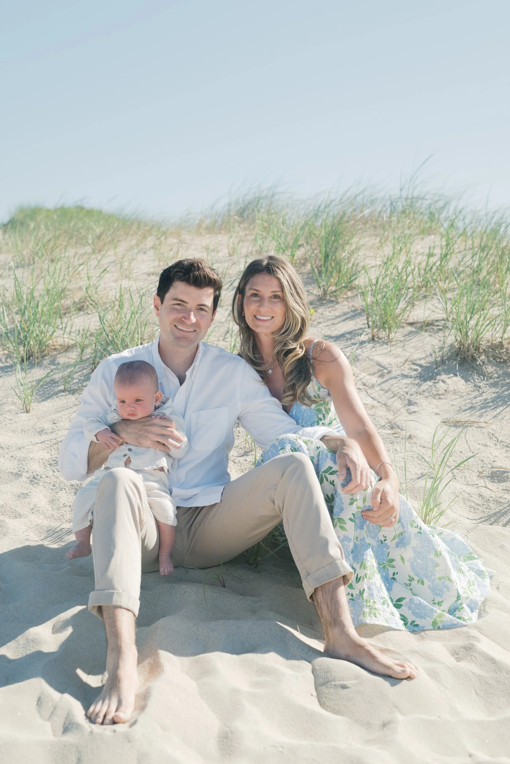7. Parents and their four month old son on a blue bird day in East Hampton