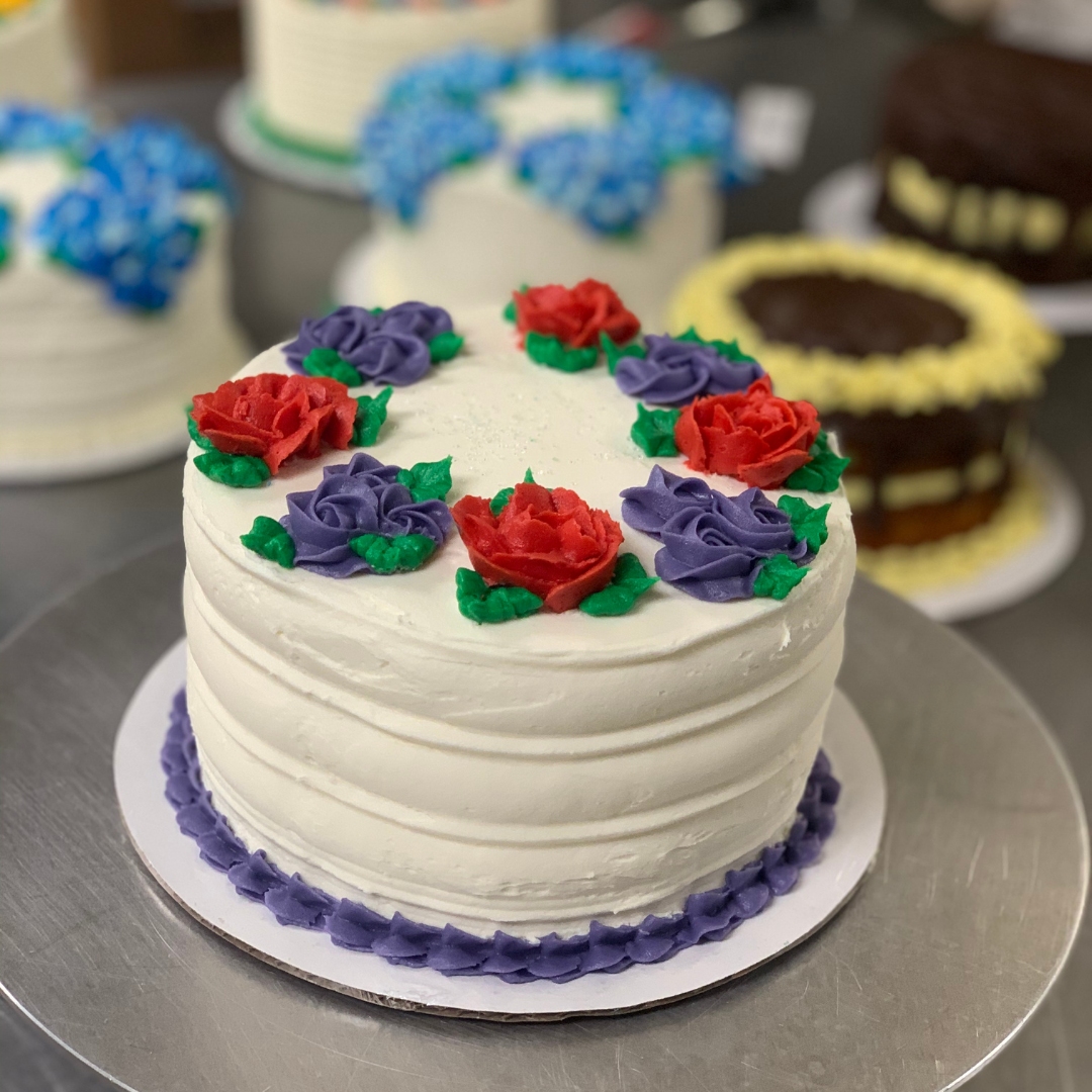 Sweet Berry Farm floral cake purple red.png