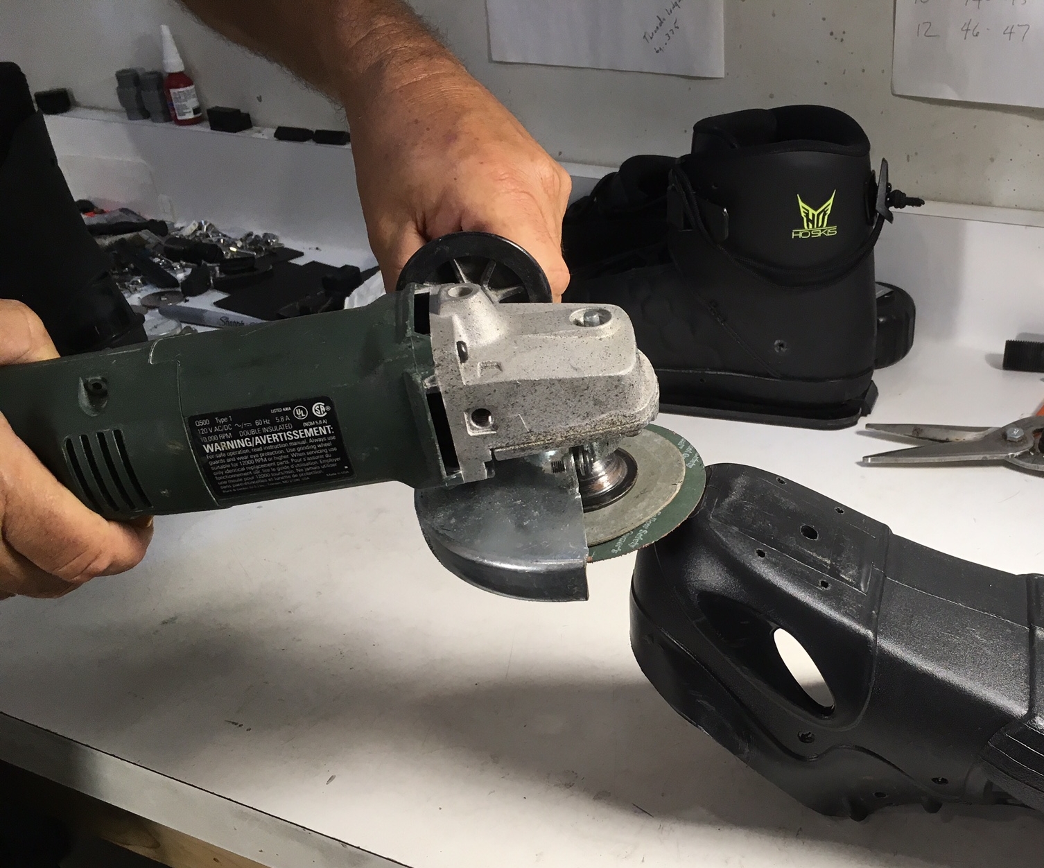 Use grinder w/ sanding pad to trim boots.