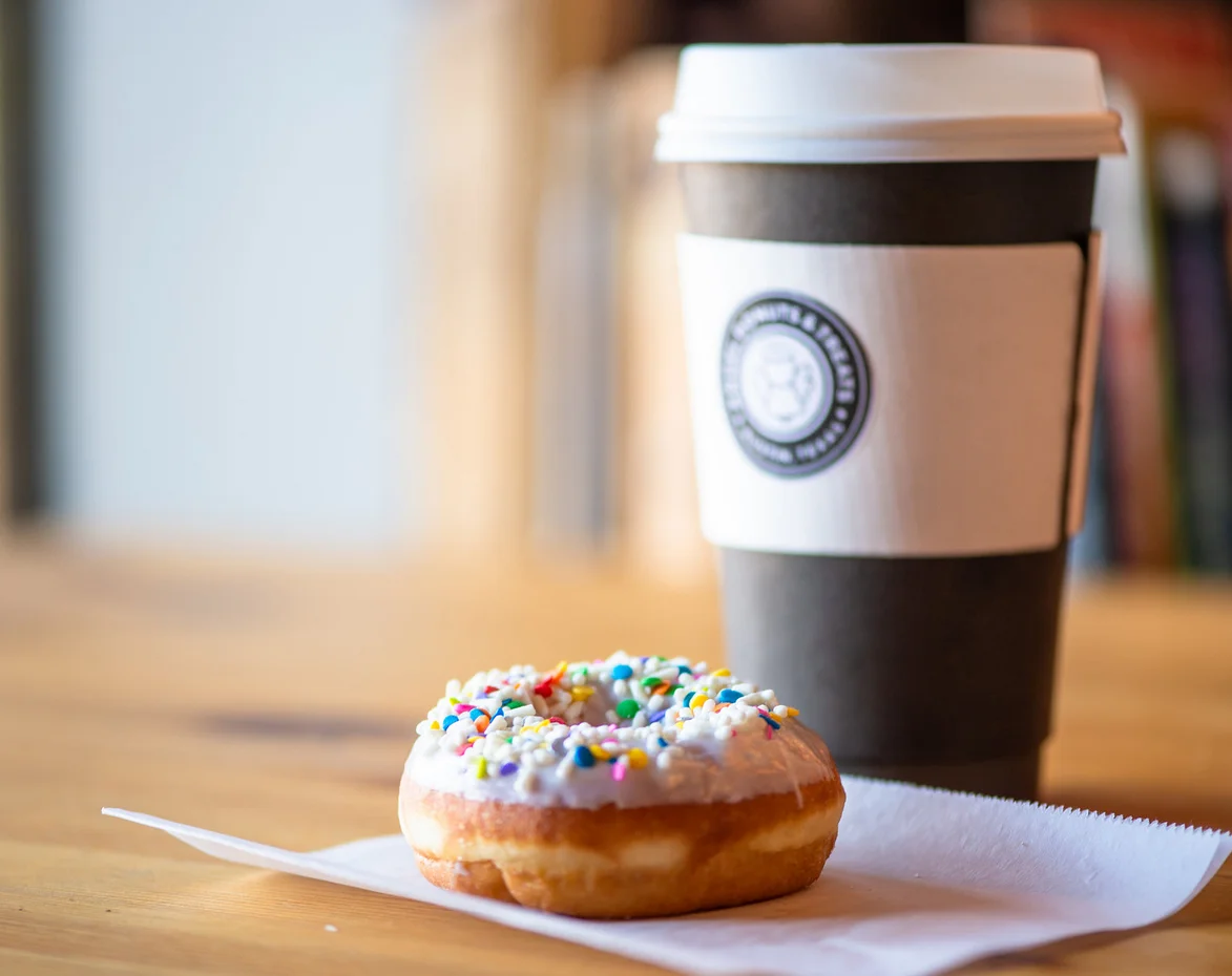 Iced Sprinkled Donut with Dark Roast Cafe du Monde