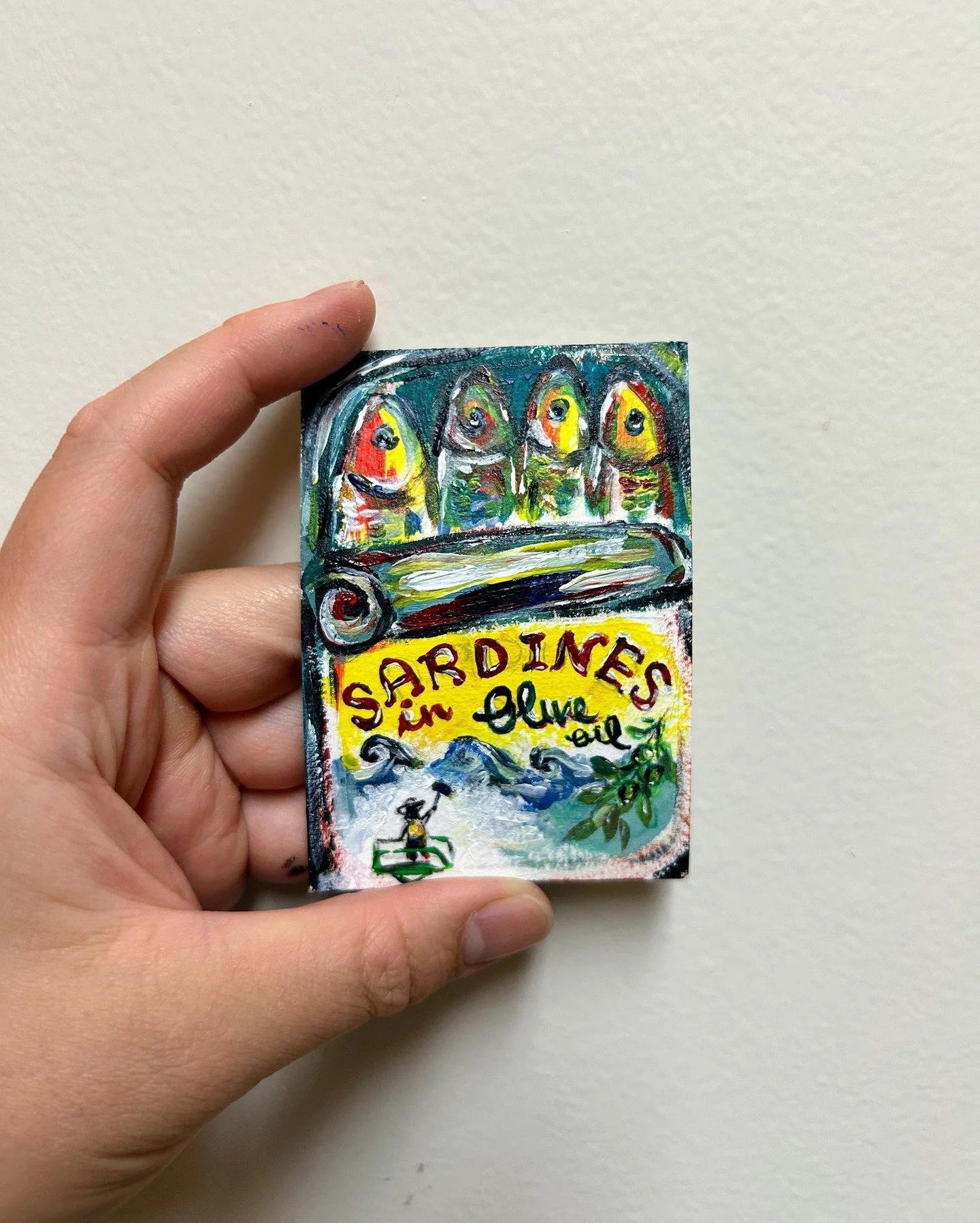 That time when I painted a "mural"...
of a can of sardines that can fit on a business card :) 
Some acrylic paints, imagining something big on something small, the good company of my friend, and a good time.