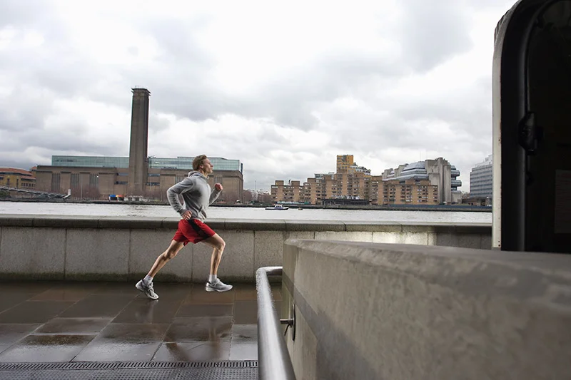 Man-jogging-along-a-river.jpg