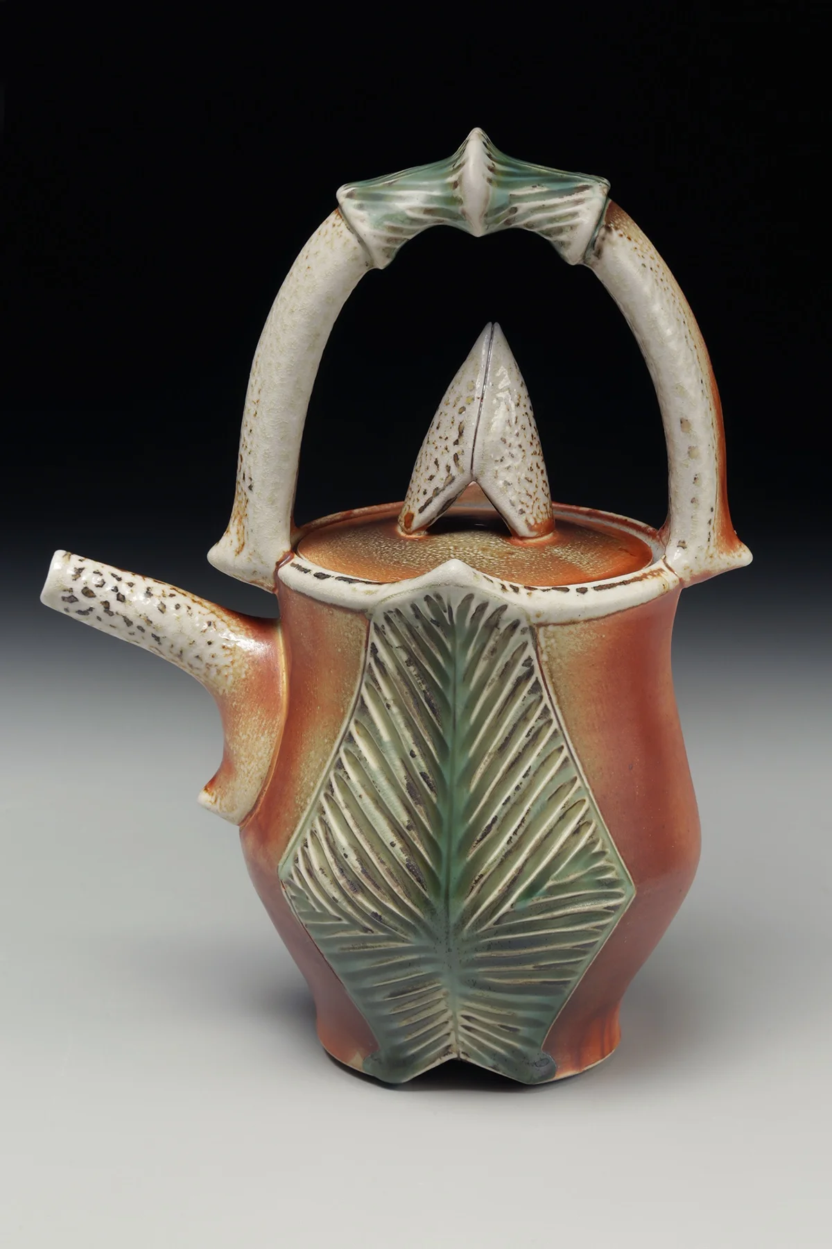 3. Joy Tanner Carved Teapot.jpg