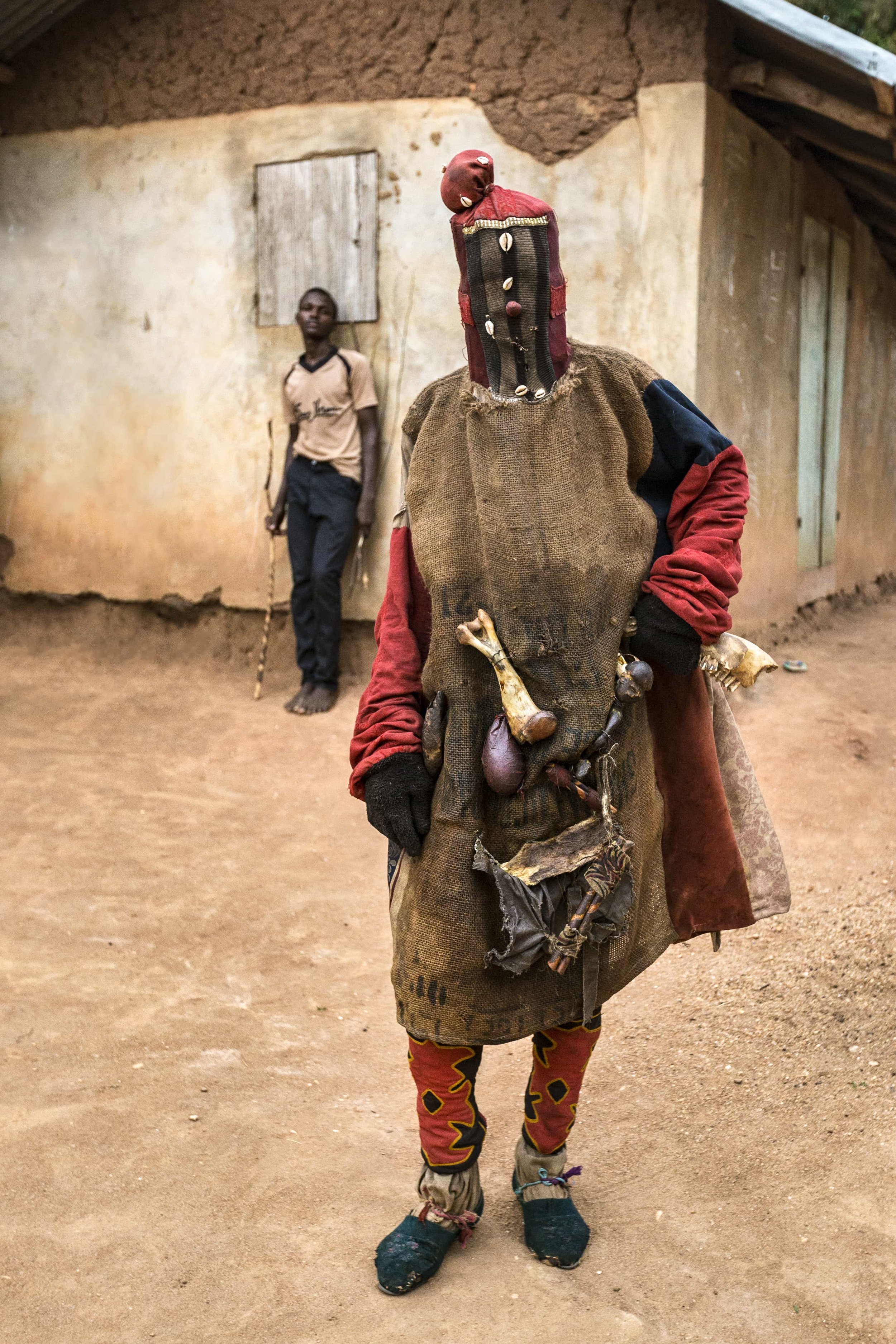  Portrait of a masqueraded Egoun Goun spirit at a Voodoo ritual ceremony. 