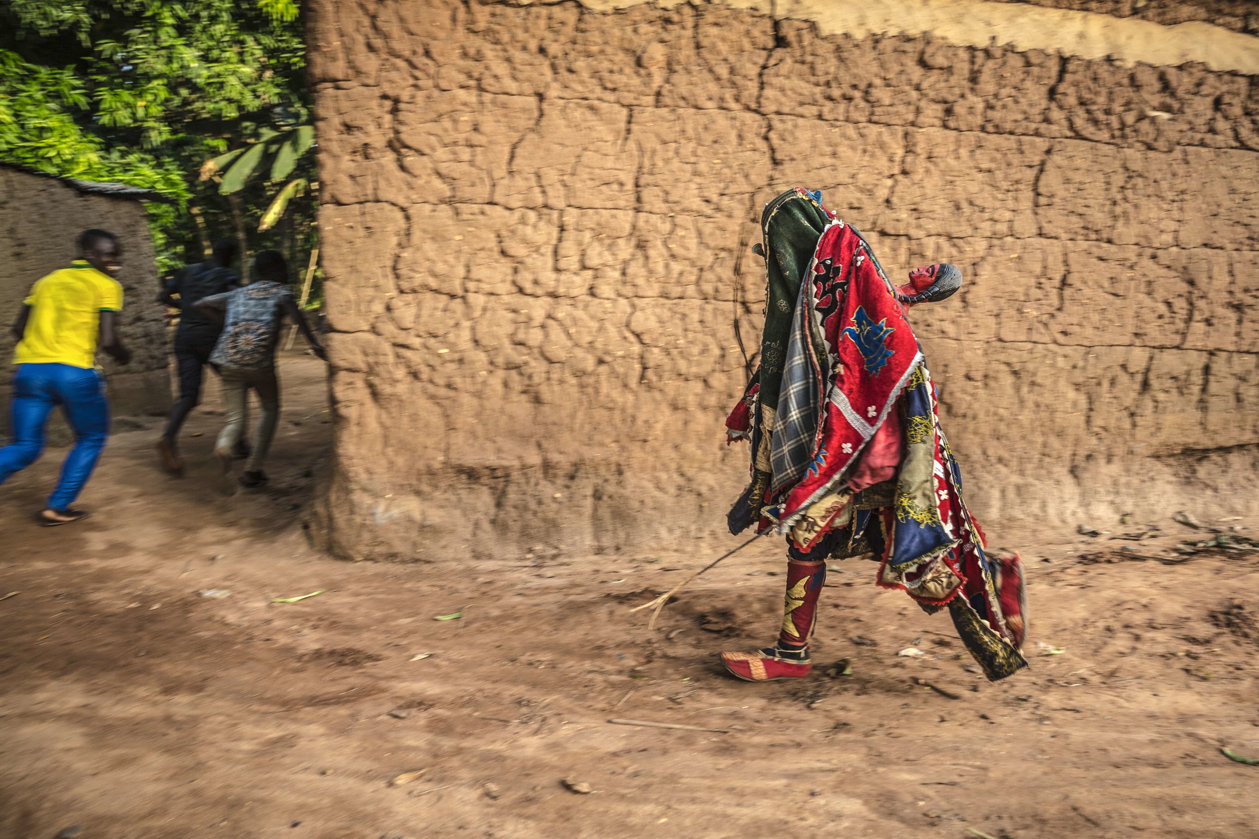  The masqueraded figures embodying the spirits of the non-living chase the crowd trying to hit the people with rods, woods or even knives. The effect of the escape is particularly exciting, commended with a sacral fear and festive joy for the manifes