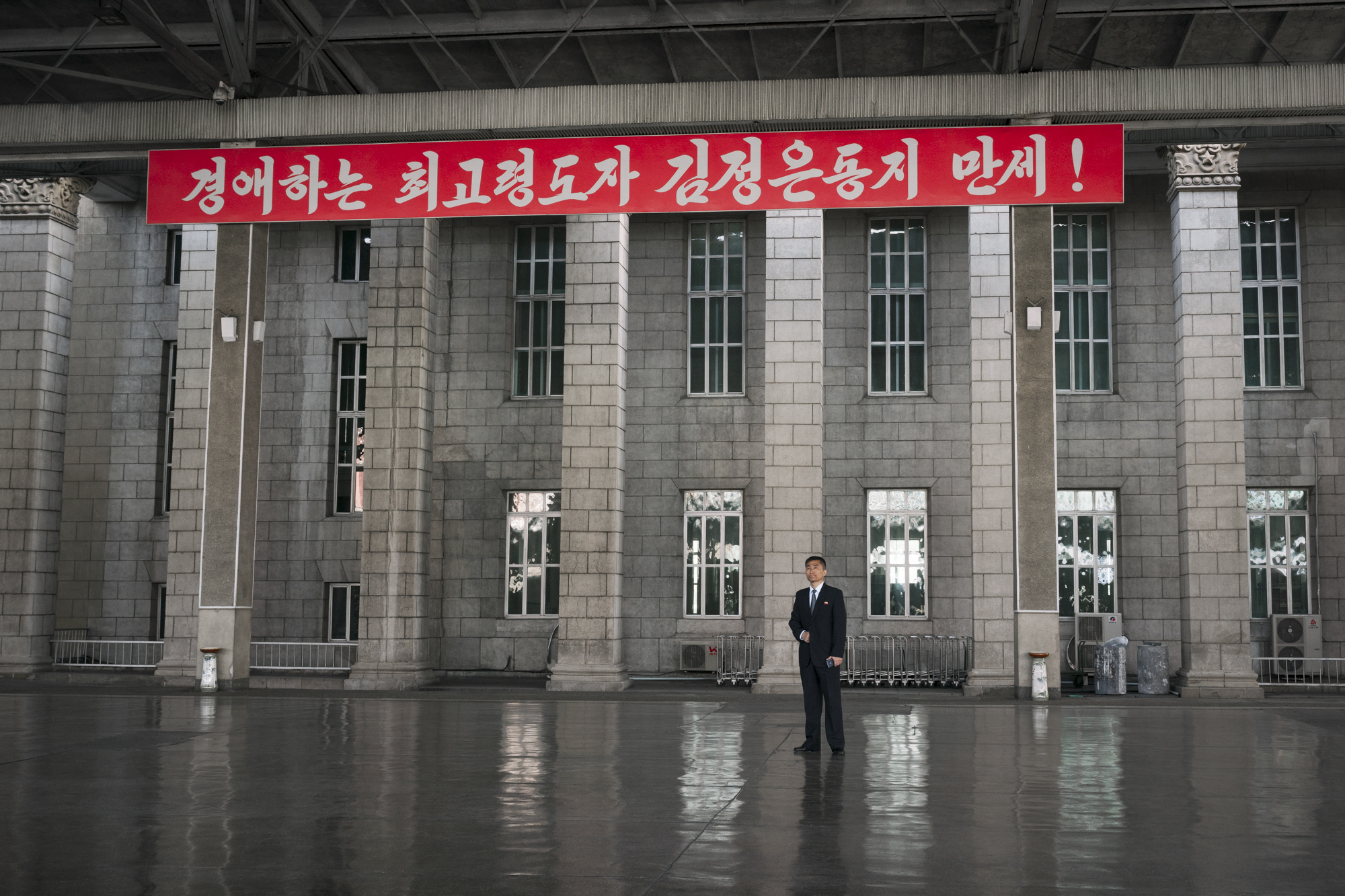 A North Korean man is standing by the platform n.1 at the Pyongyang Railway Station, which also serves as the main station in North Korea connecting most of the cities in the country.