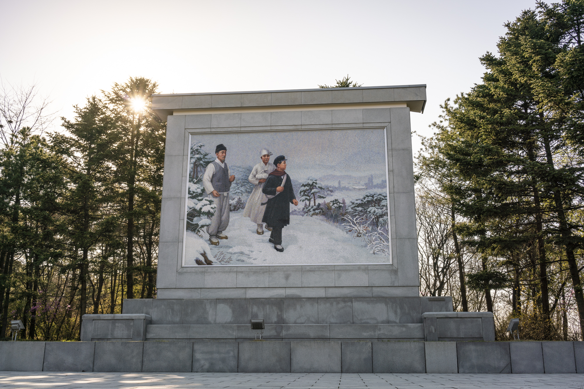 A mosaic depicting Kim Il Sung as a young man leaving home to lead the resistance against the Japanese. Mangyongdae, just outside Pyongyang, is the birthplace of Kim Il Sung. The area, considered a sacred site, is a place of revolutionary pilgrimag