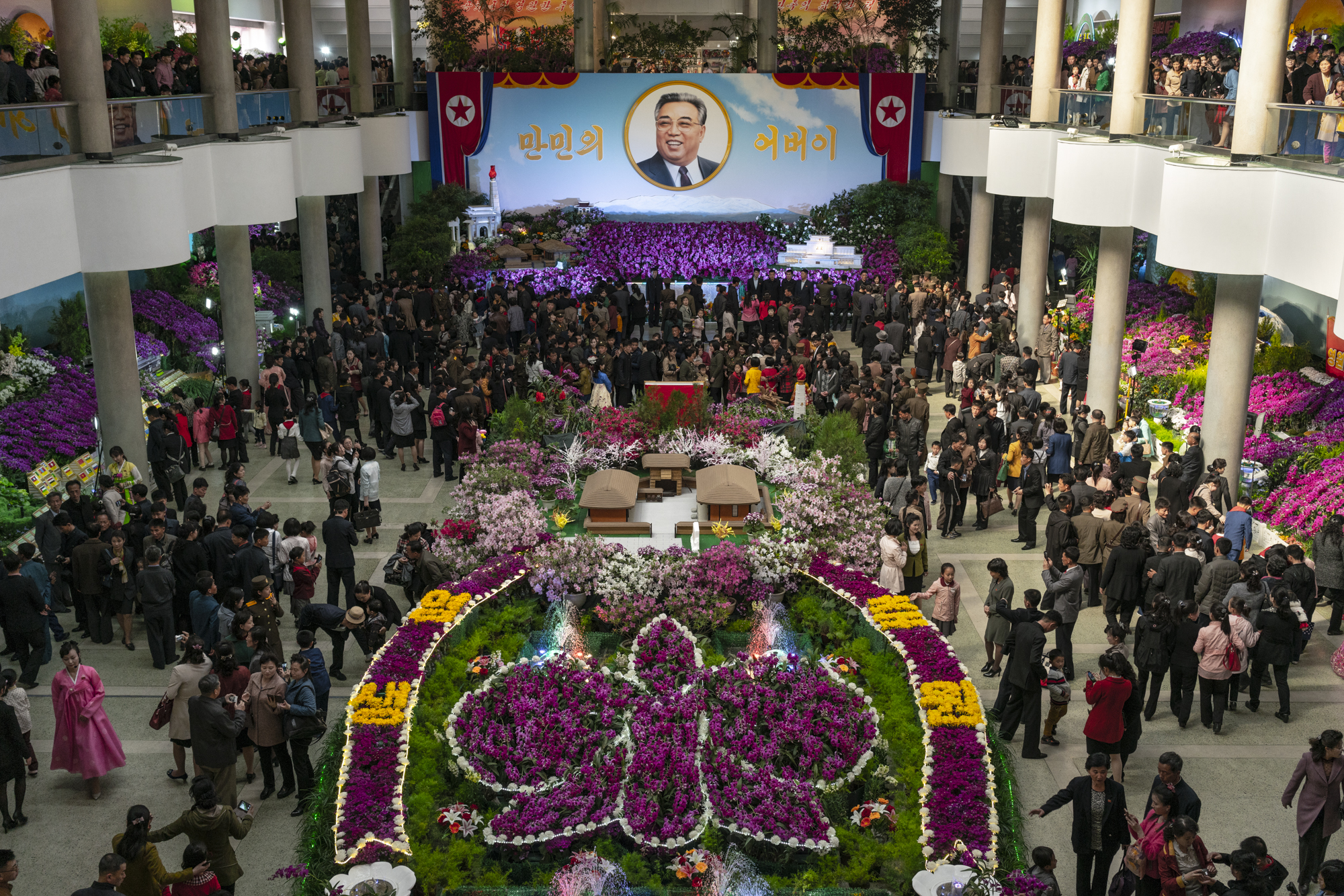  On the birthday anniversary of the former Great Leader Kim Il Sung, thousands of North Koreans visit various monuments as the Kimilsungia and Kimjongilia Flower Exhibition Hall located by the Taedong riverside.  The Kimilsungia and Kimjongilia Flowe