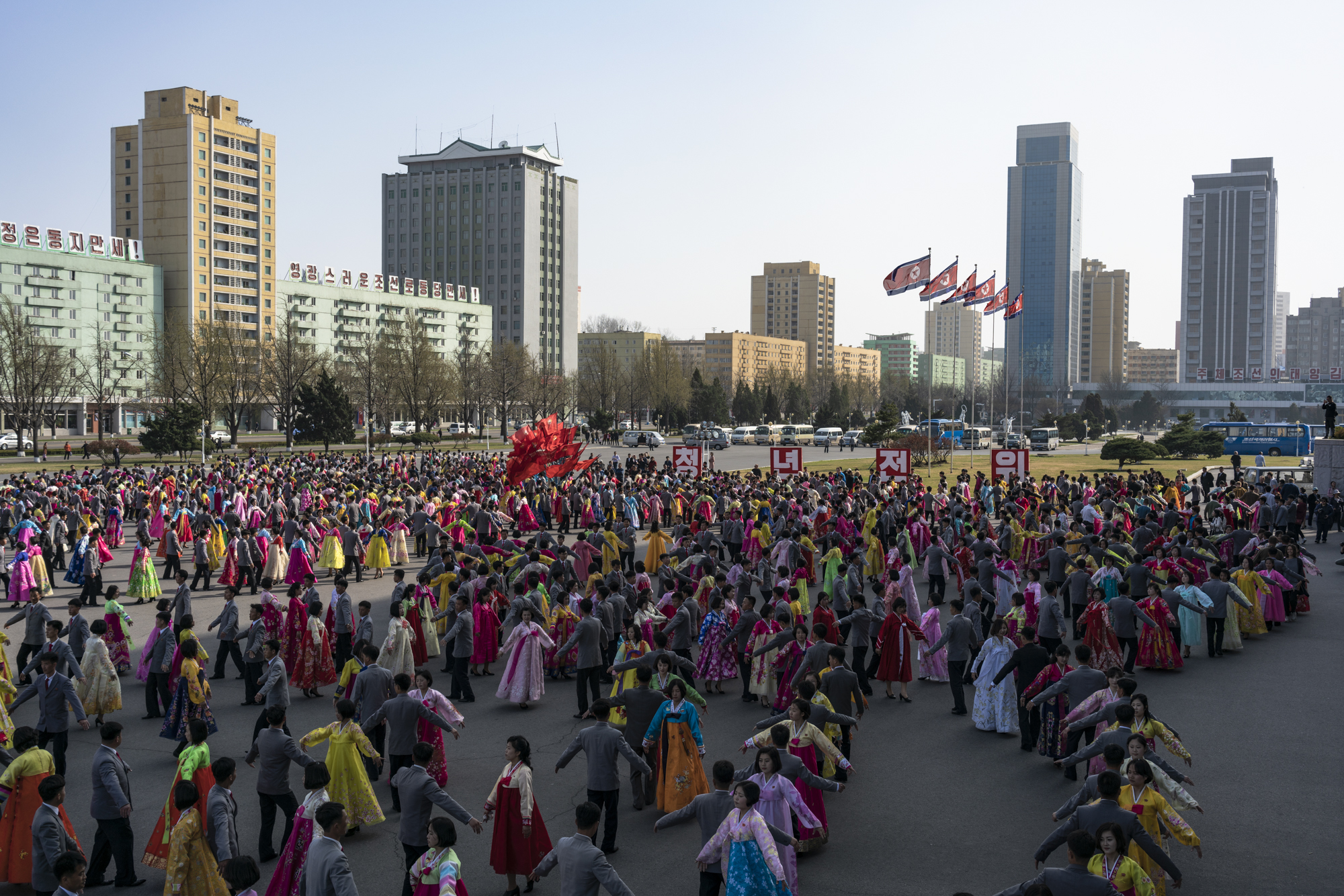  North Korean students perform at a Mass Dance in honour of the former Great Leader Kim Il Sung on his birthday anniversary in Pyongyang on April 15.  Mass Dances are large choreographed dances, accompanied by revolutionary and folk music, taking pla