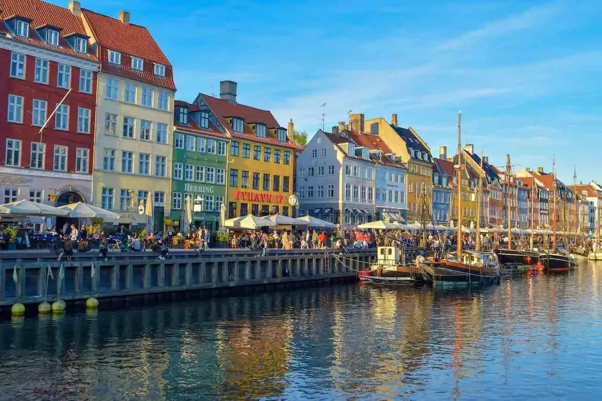 Brightly coloured 17th century houses lining the Nyhavn canal in Copenhagen