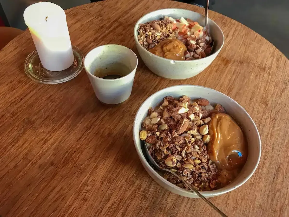 Bowl of porridge with toppings at Grød, Copenhagen's first porridge cafe