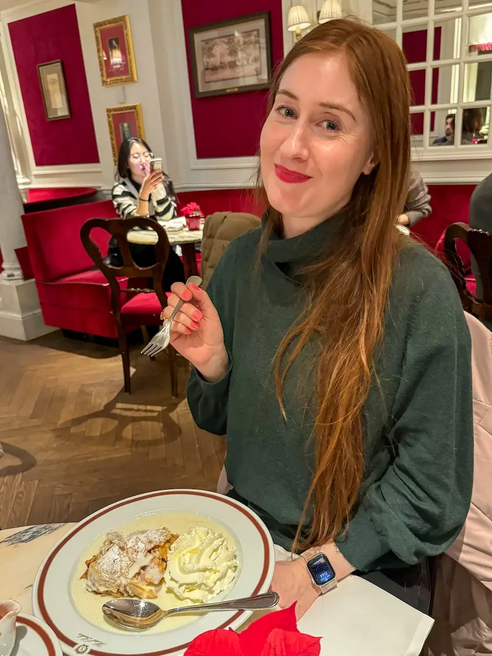Amber eating Strudel at Hotel Sacher