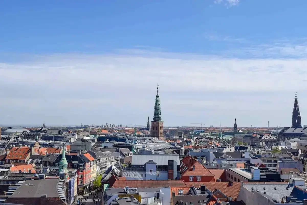 Panoramic view over Copenhagen rooftops from the top of the Round Towe