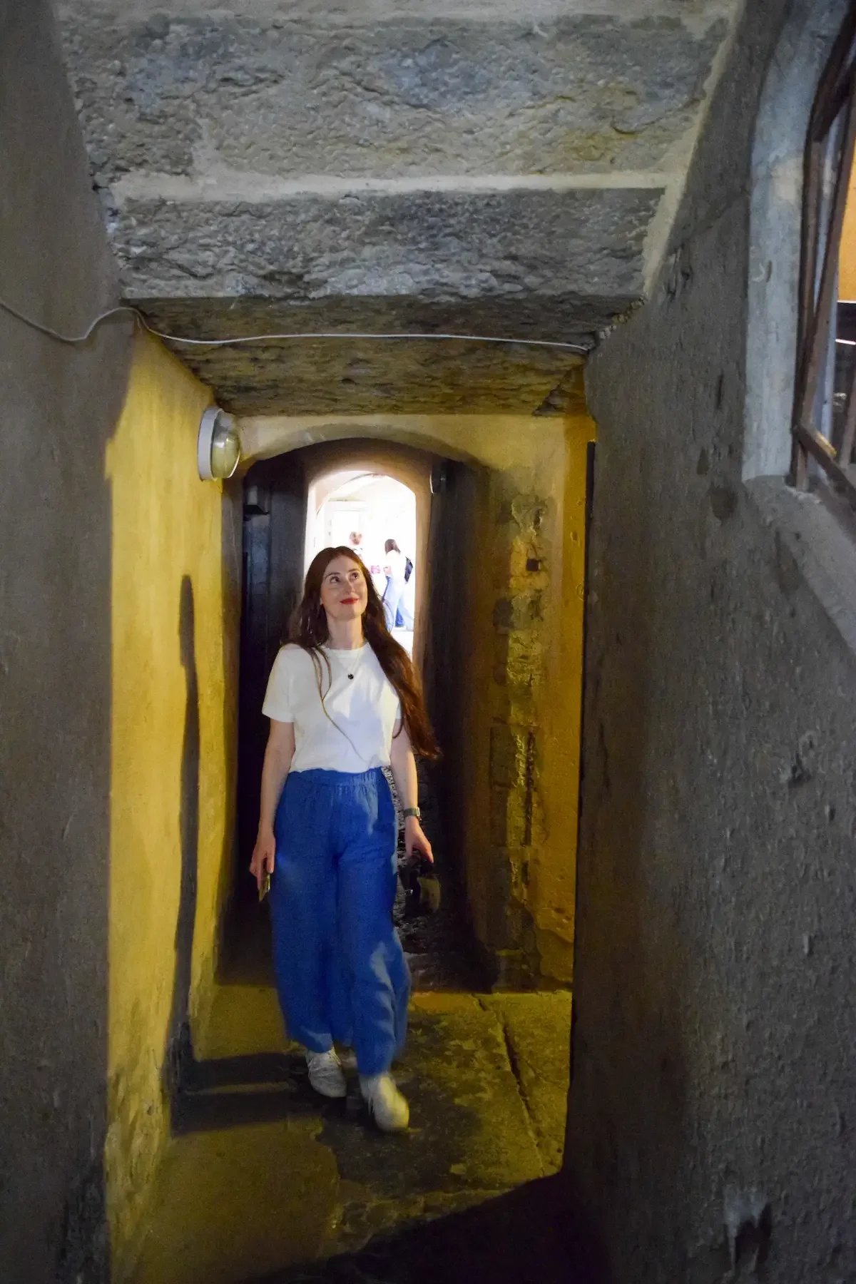 Amber walking through traboule in Lyon