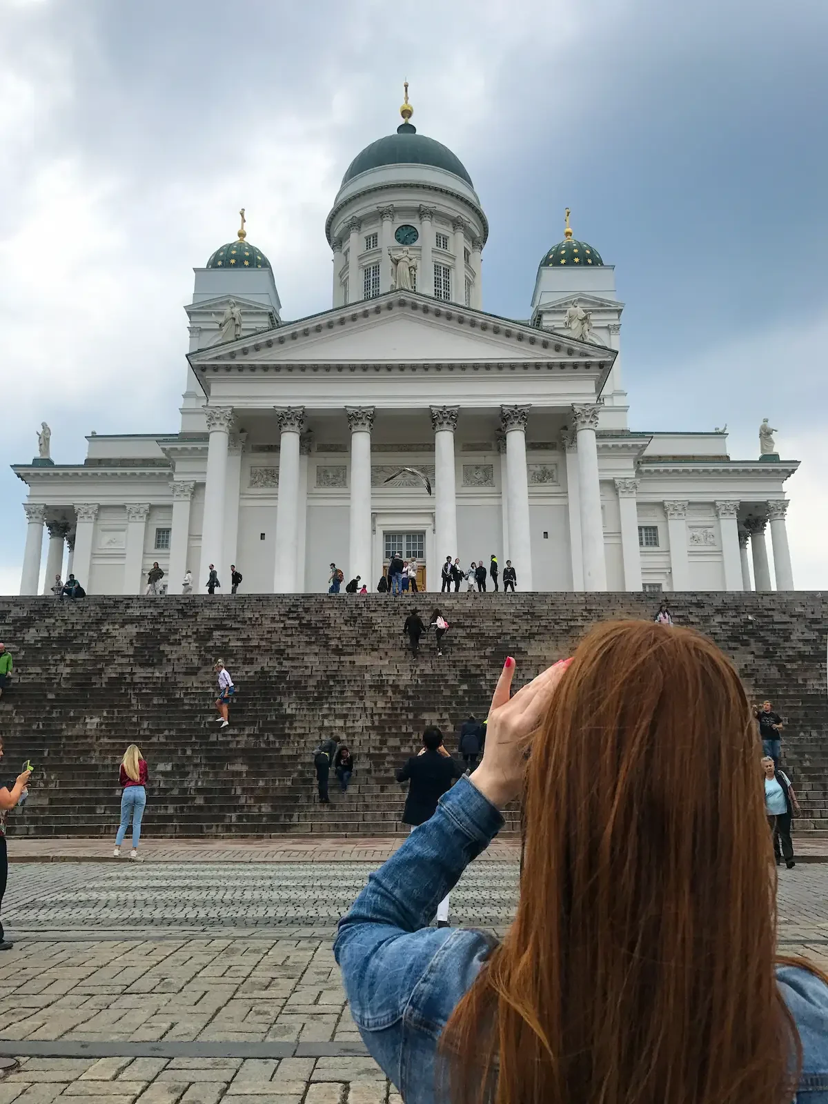Amber taking a photo of Helsinki cathedral