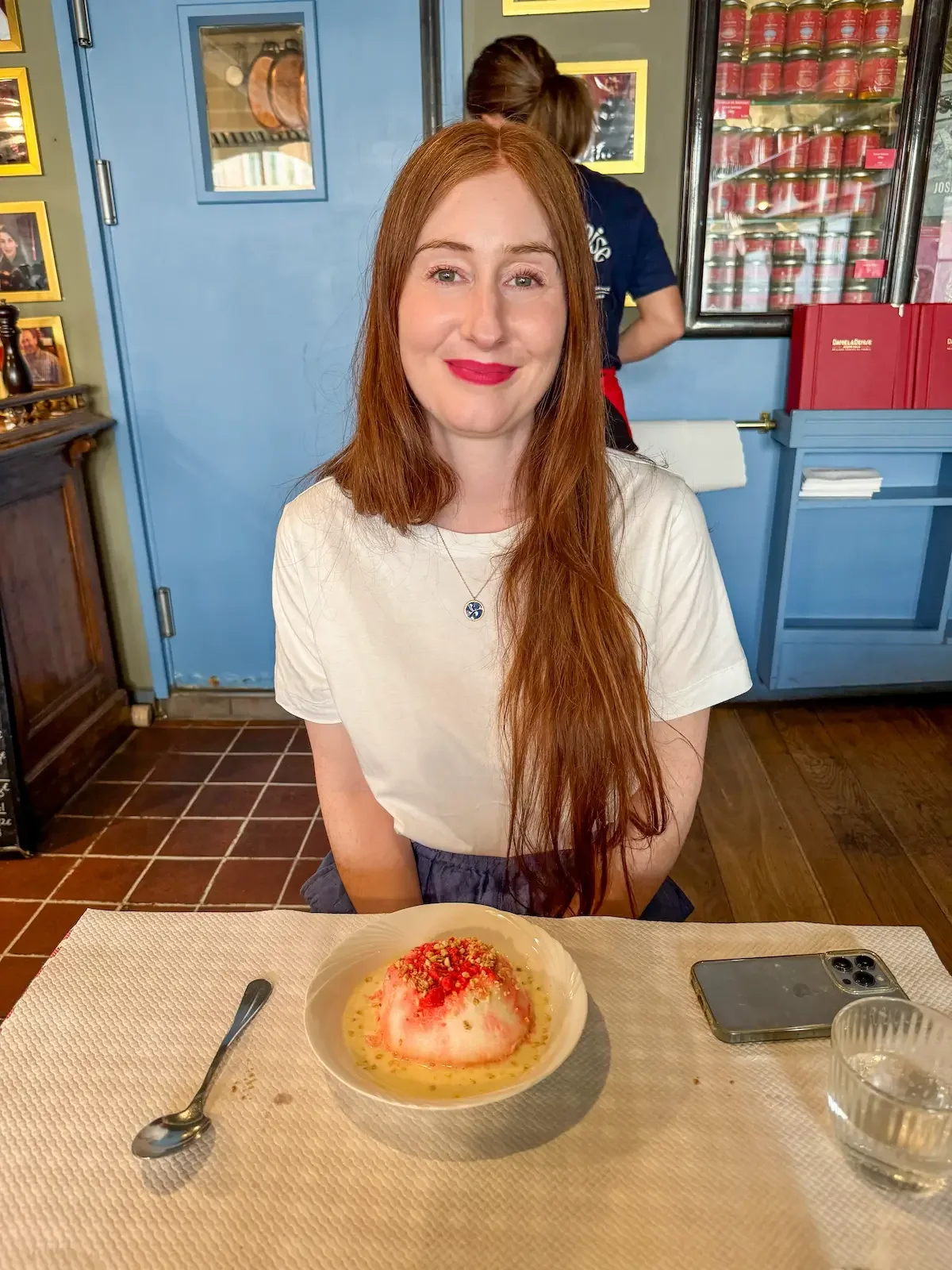 Amber at Daniel et Denise in Lyon with floating island dessert