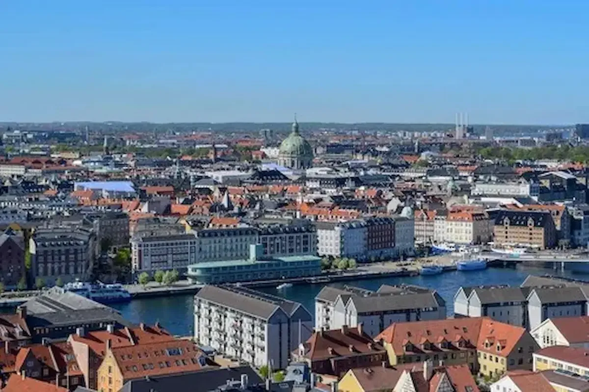 View over Copenhagen rooftops and harbour from the top of the Church of Our Saviour