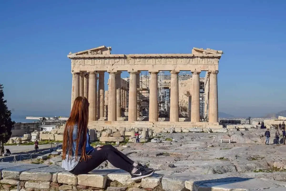 Travel blogger Amber Robertson at the Parthenon on the Acropolis of Athens