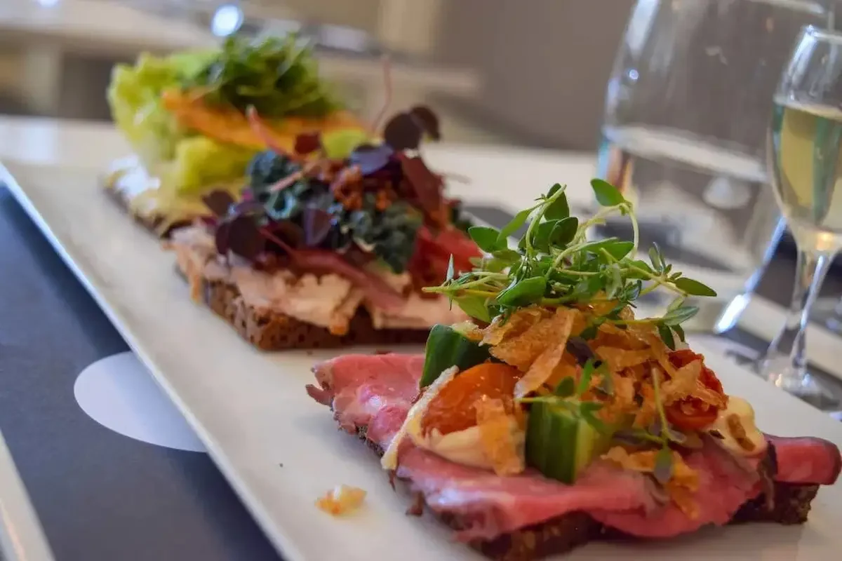 Traditional Danish smørrebrød open sandwiches at Aamanns Deli in Copenhagen
