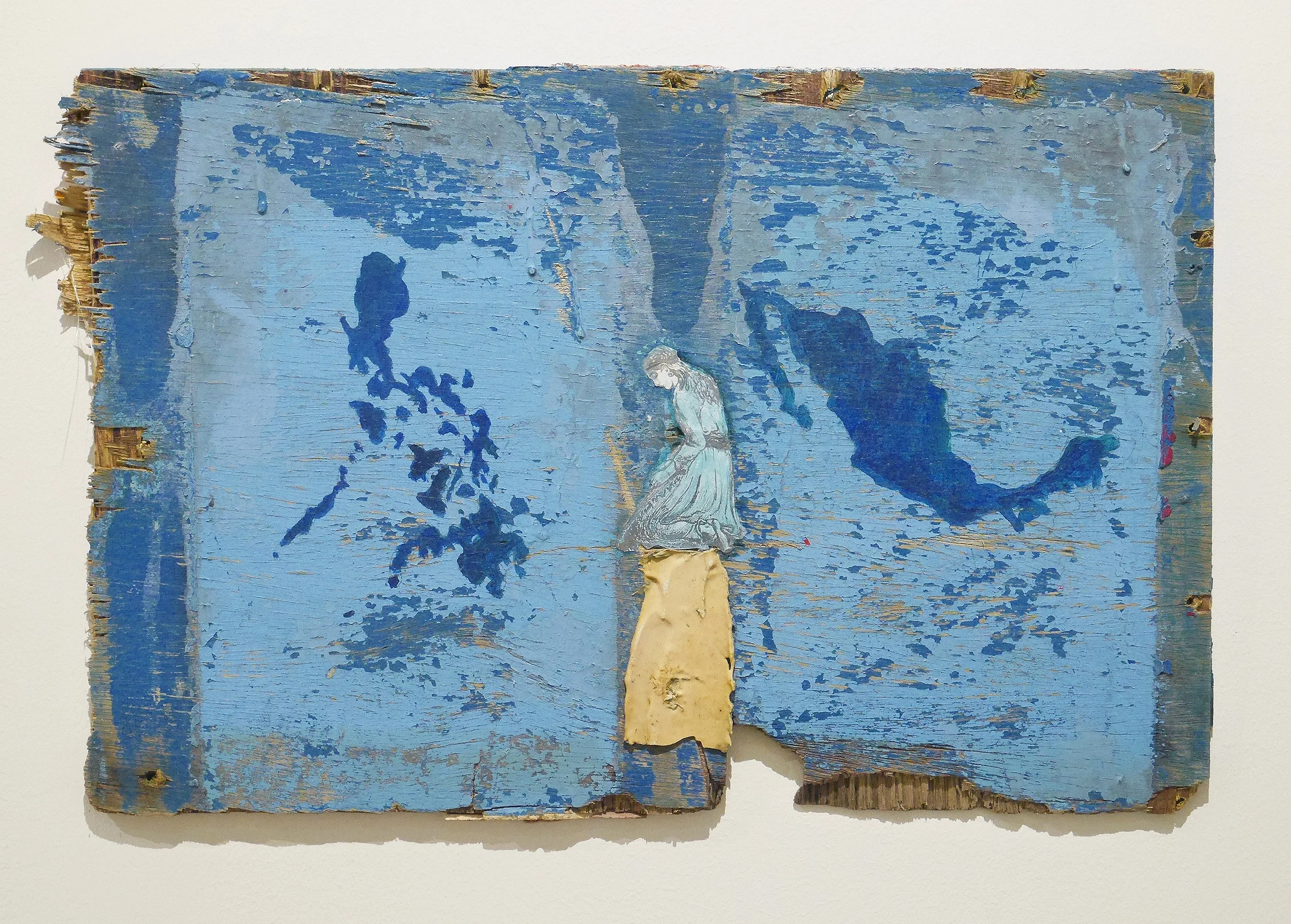 The Cross(ing), 2017. Acrylic and collage on driftwood, 11 x 17.5 inches