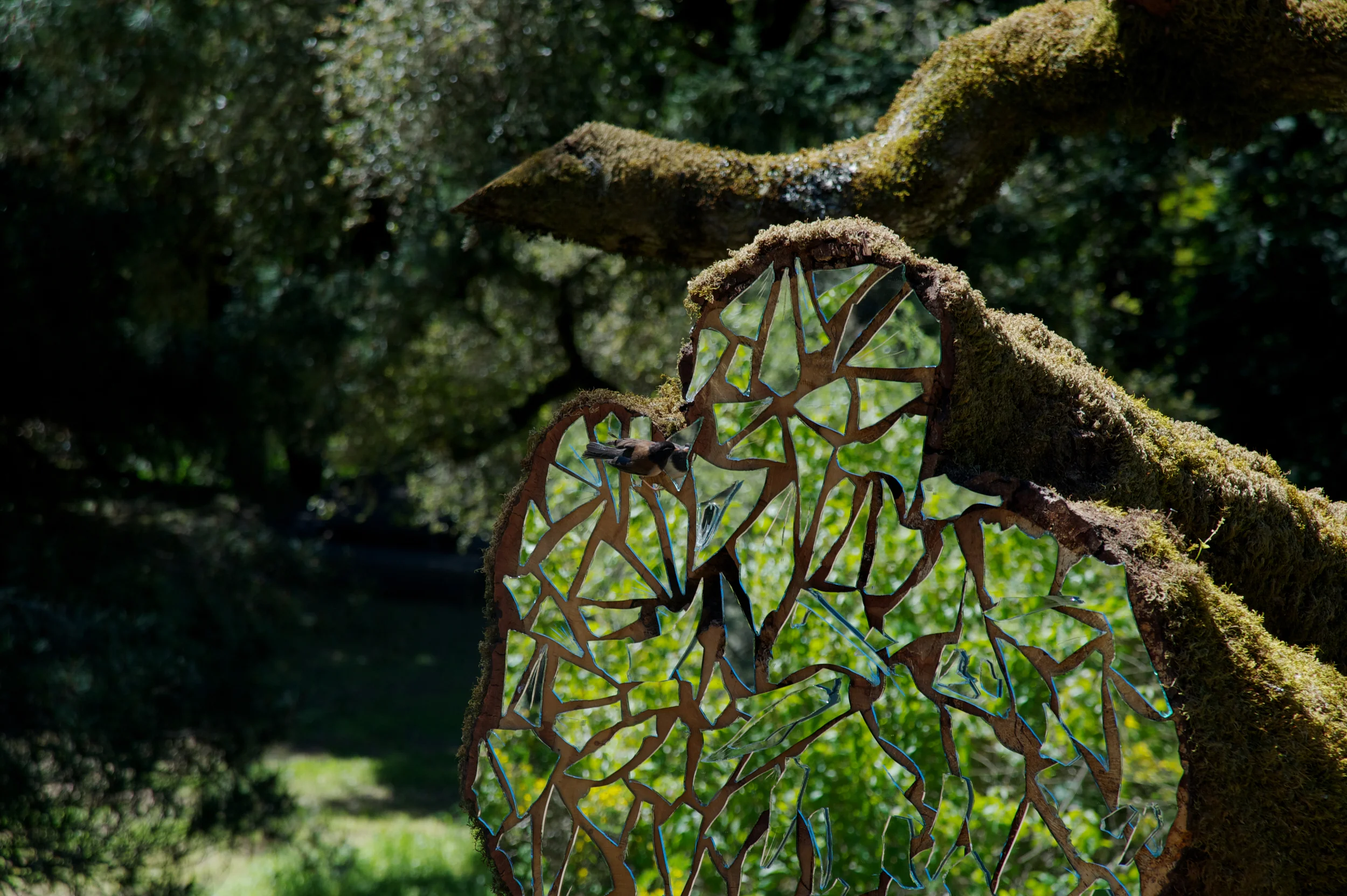   After the Celestial Axe  &nbsp;is a sculpture with 27 mirrored surfaces that reveals a magical, multi-planar universe. As you walk through the forest, you encounter the sculpture shining mysteriously and brightly through the trees. The sculpture is