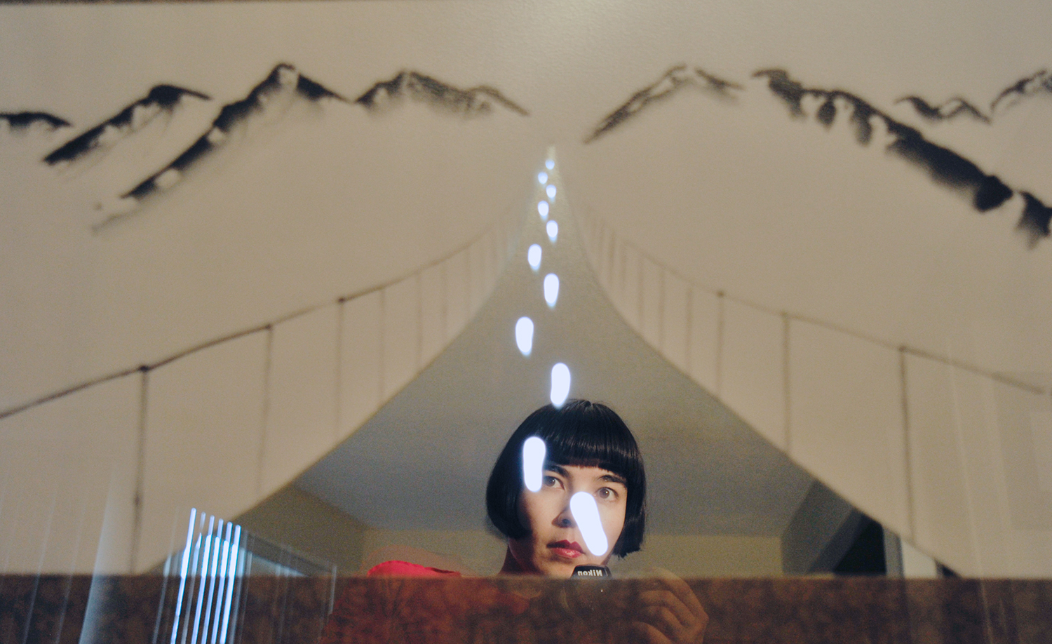 Each viewer sees herself/himself in the art, cast into the bridge